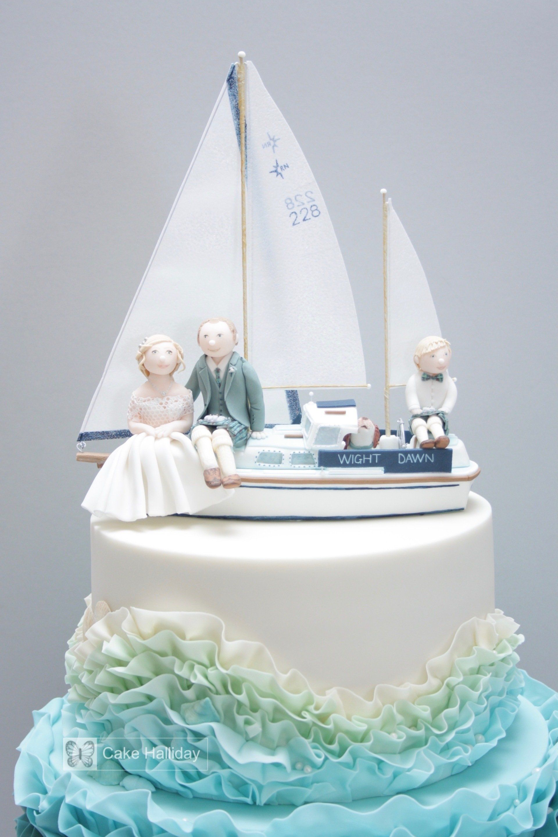Wedding cake with blue ruffles, sugar boat & bride/groom figures, Ayrshire, Glasgow, Scotland