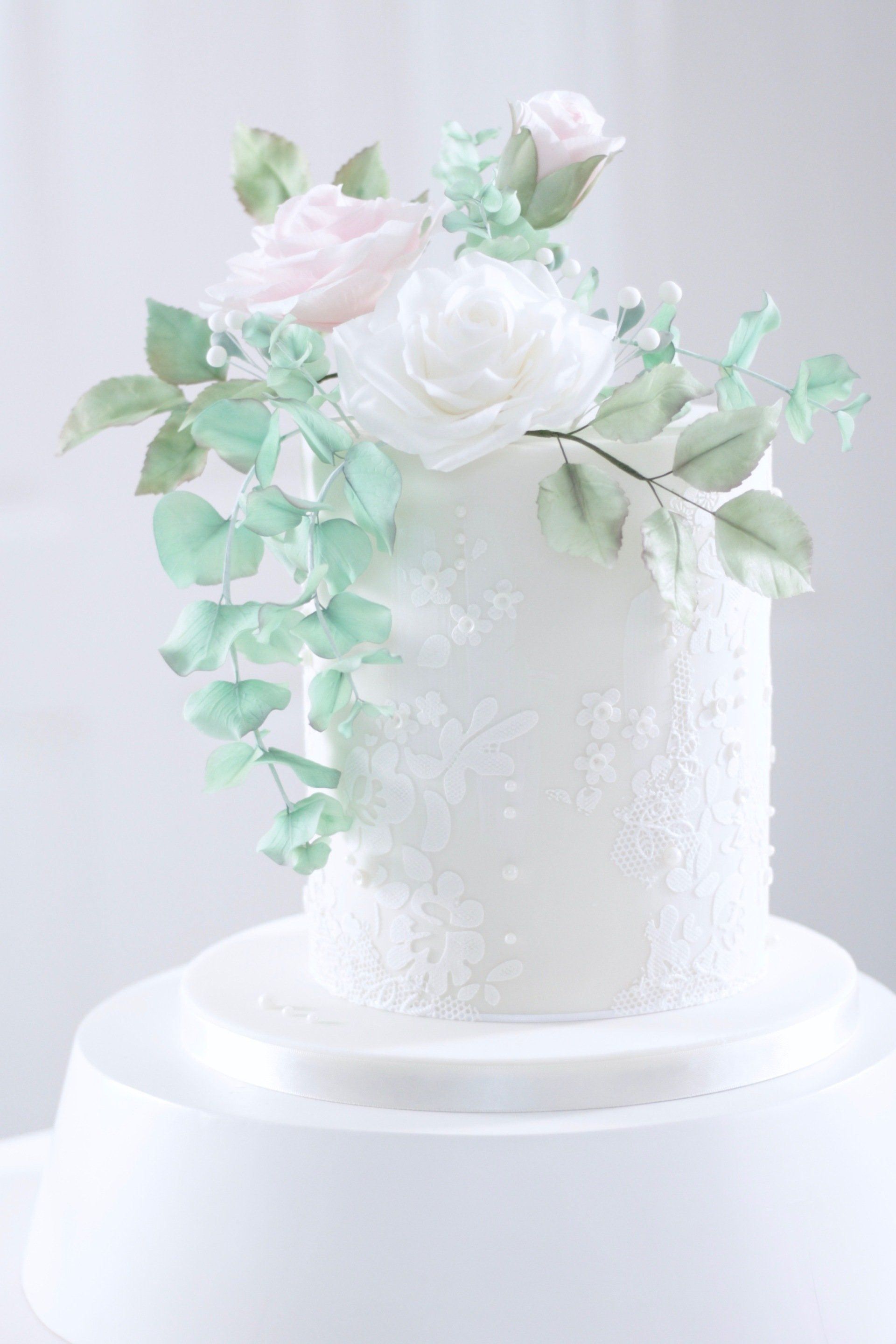 Lace  wedding cake with sugar roses