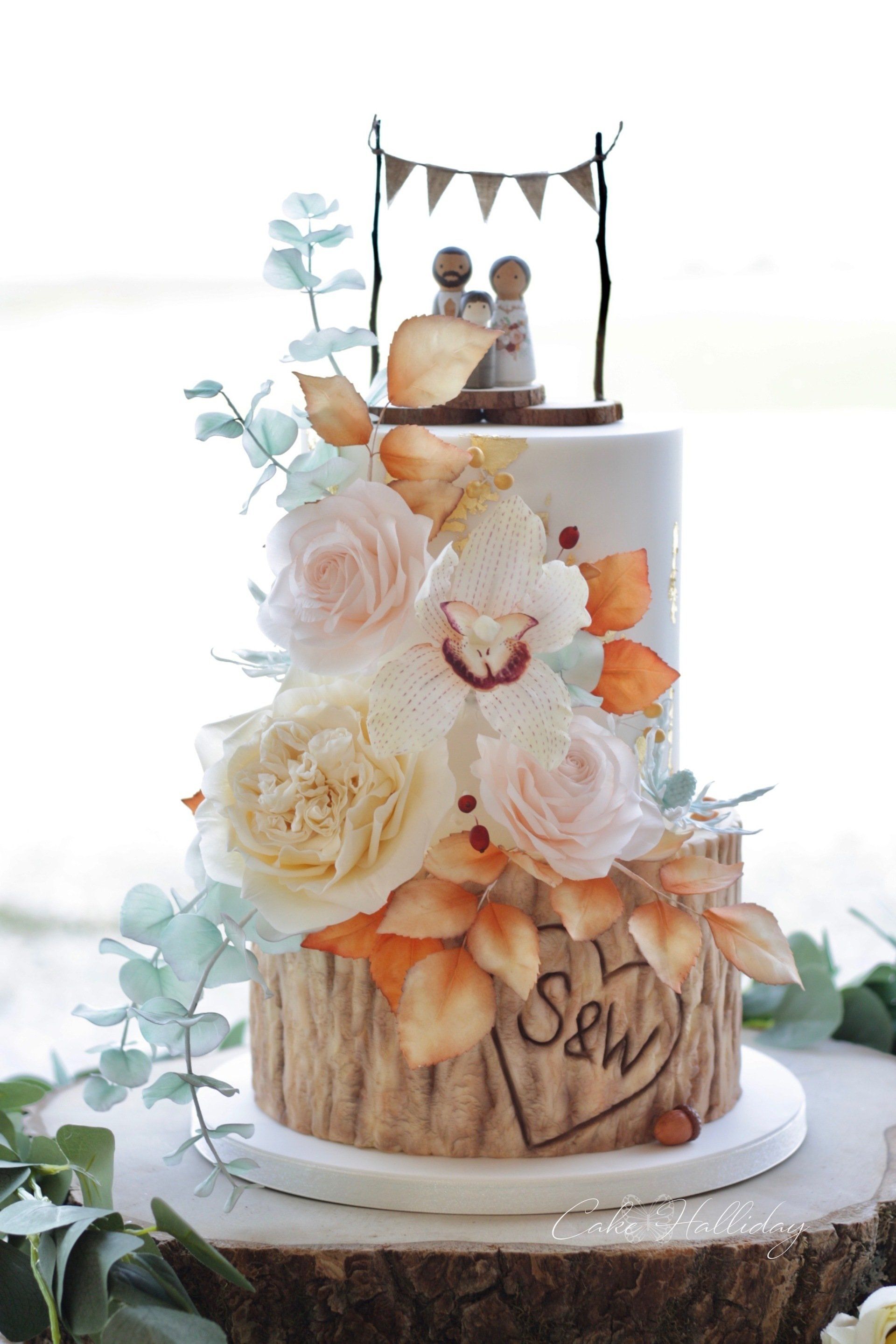 Log tier & sugar flower wedding cake