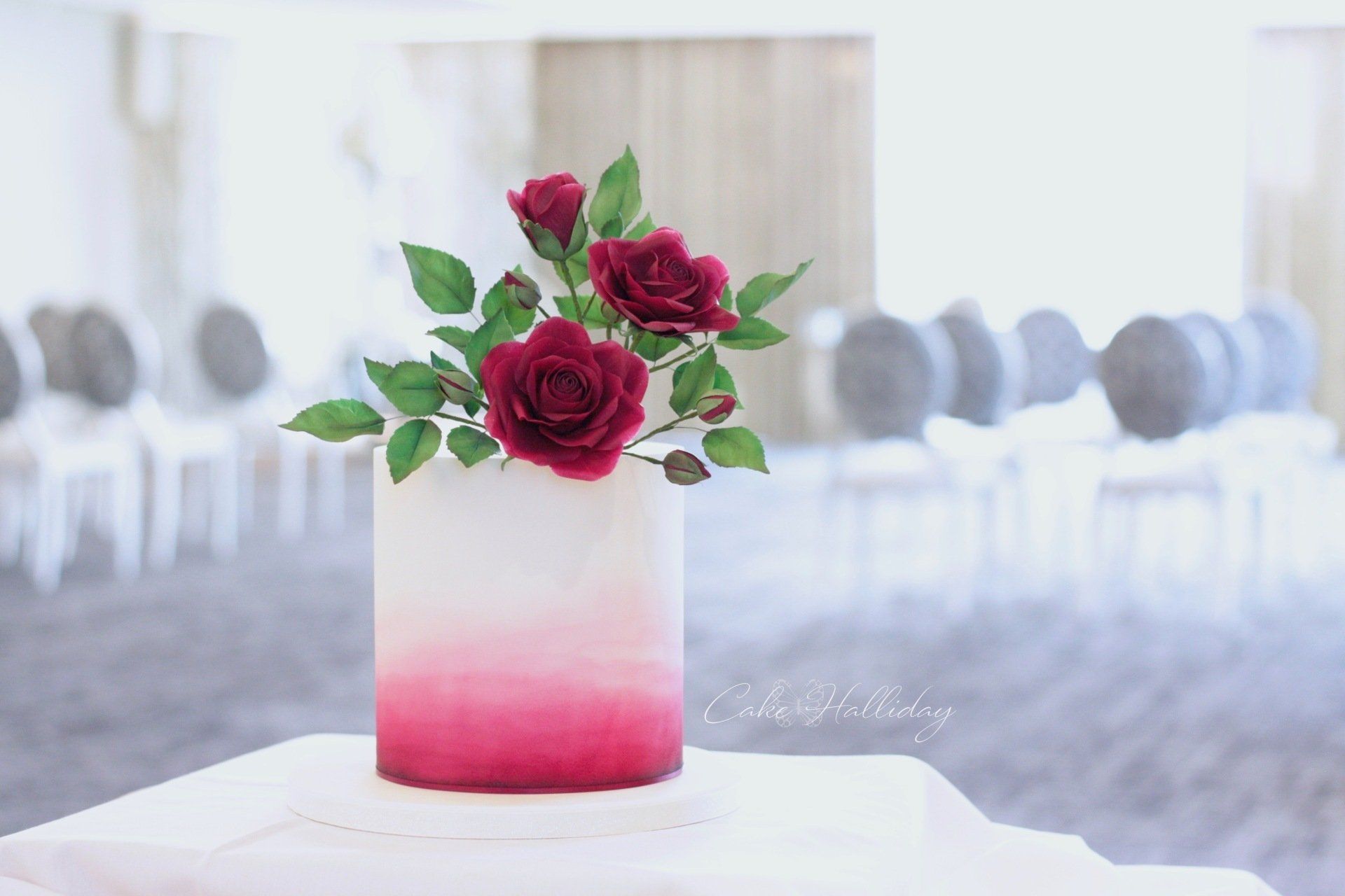 Burgundy red sugar rose watercolour wedding cake