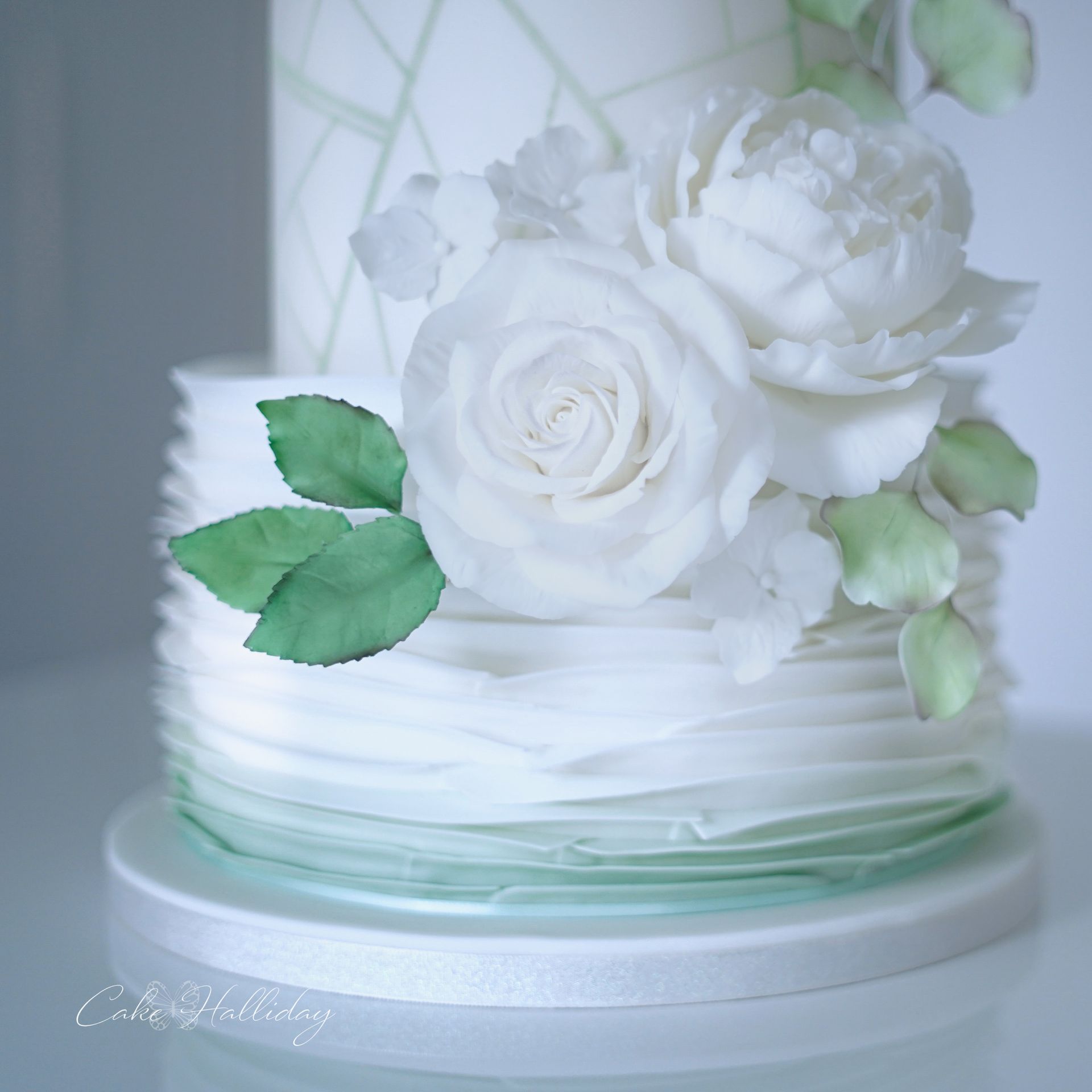 Sage green ombre wedding cake ruffles