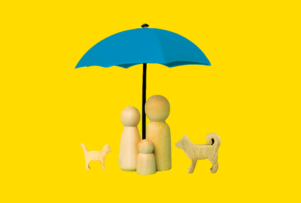 una familia de muñecos debajo de un paraguas