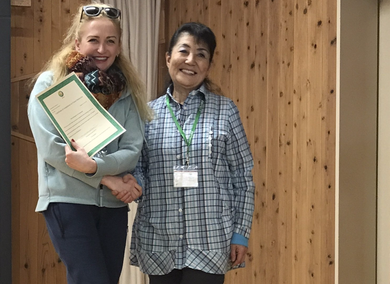 Dr. Melanie H. Adamek receiving her Forest Health Expert certificate from INFOM President Michiko Imai in Japan in 2018 Dr. Melanie H. Adamek receiving her Forest Health Expert certificate from INFOM President Michiko Imai in Japan in 2018