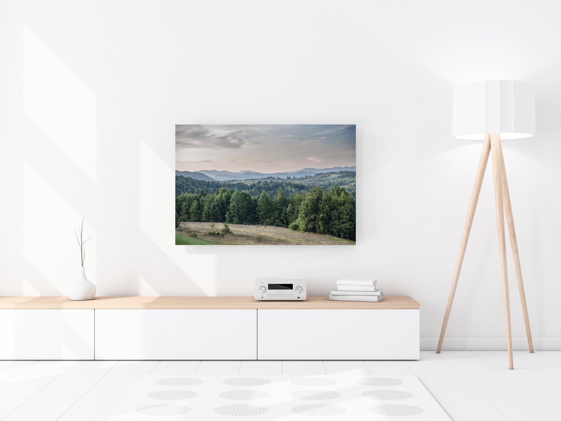 Forest glow. Blue mountains and green forests shine harmoniously in the landscape. Photographic art by Bernhard Lehn