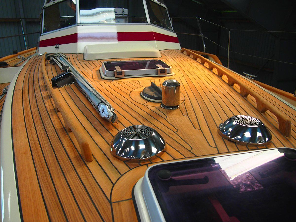 New teak deck on a Najad 37 sailing yacht construction and installation by Mobilerbootsbau German teak decking and boatbuilding company