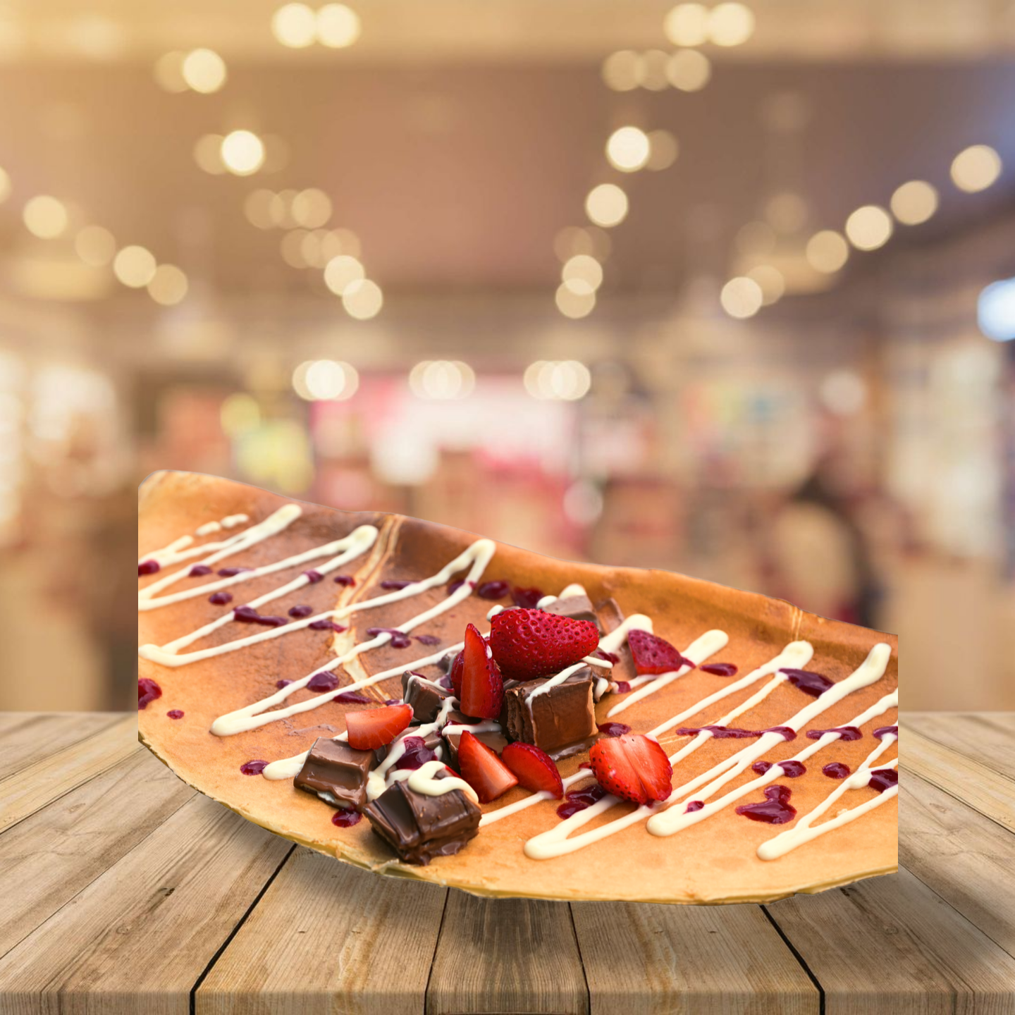 Bild von Crepes mit Nutella, Vanillesoße, Schokolade und Erdbeeren