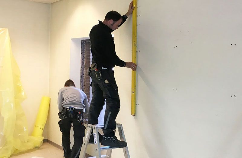 Arbeiter von Grübbel beim vermessen