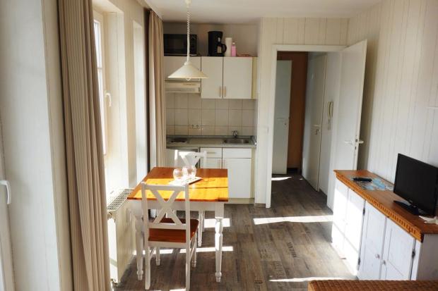 Sitzecke und Küchenzeile