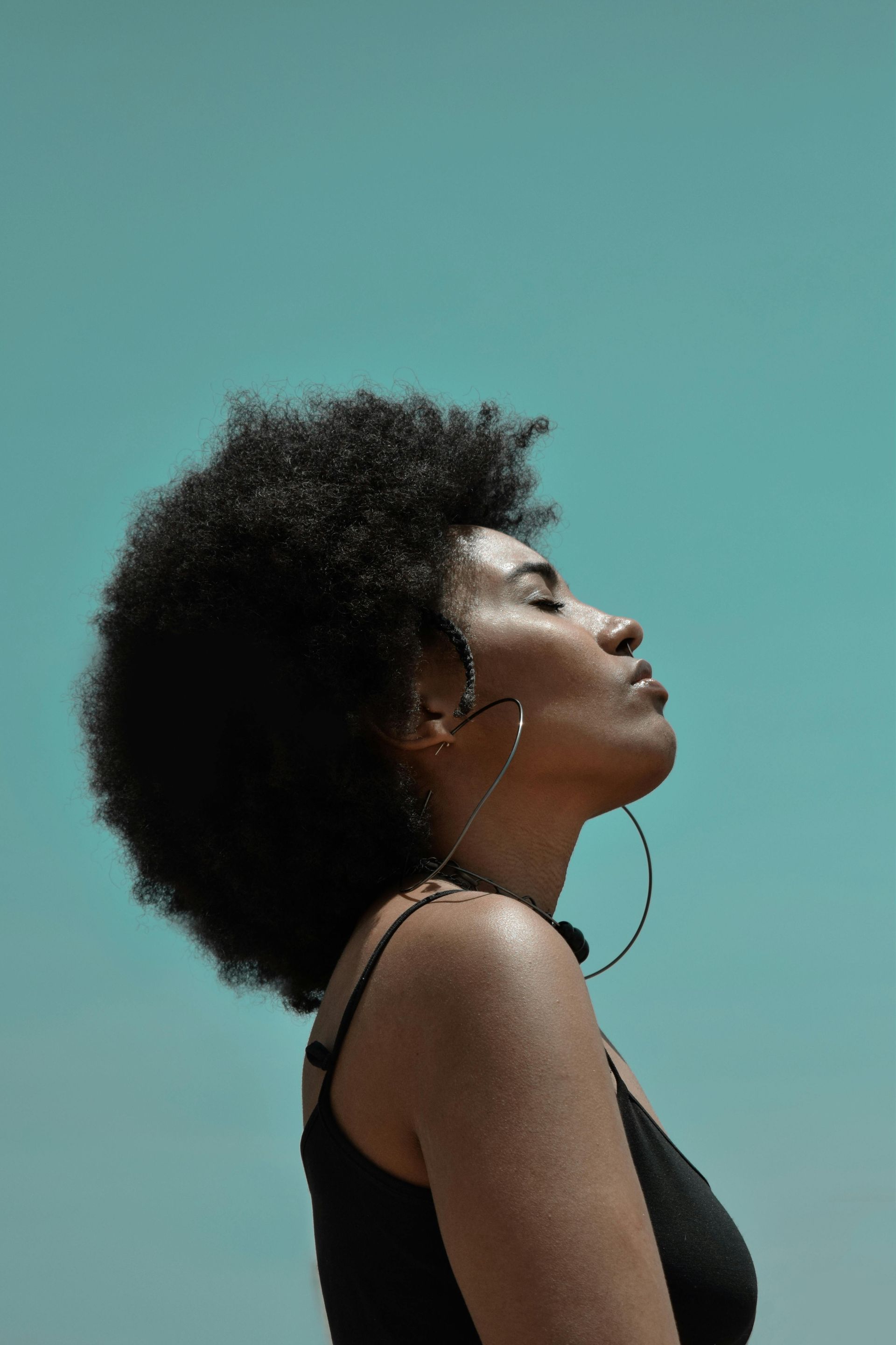 mindfulness practices, woman with headphones meditating