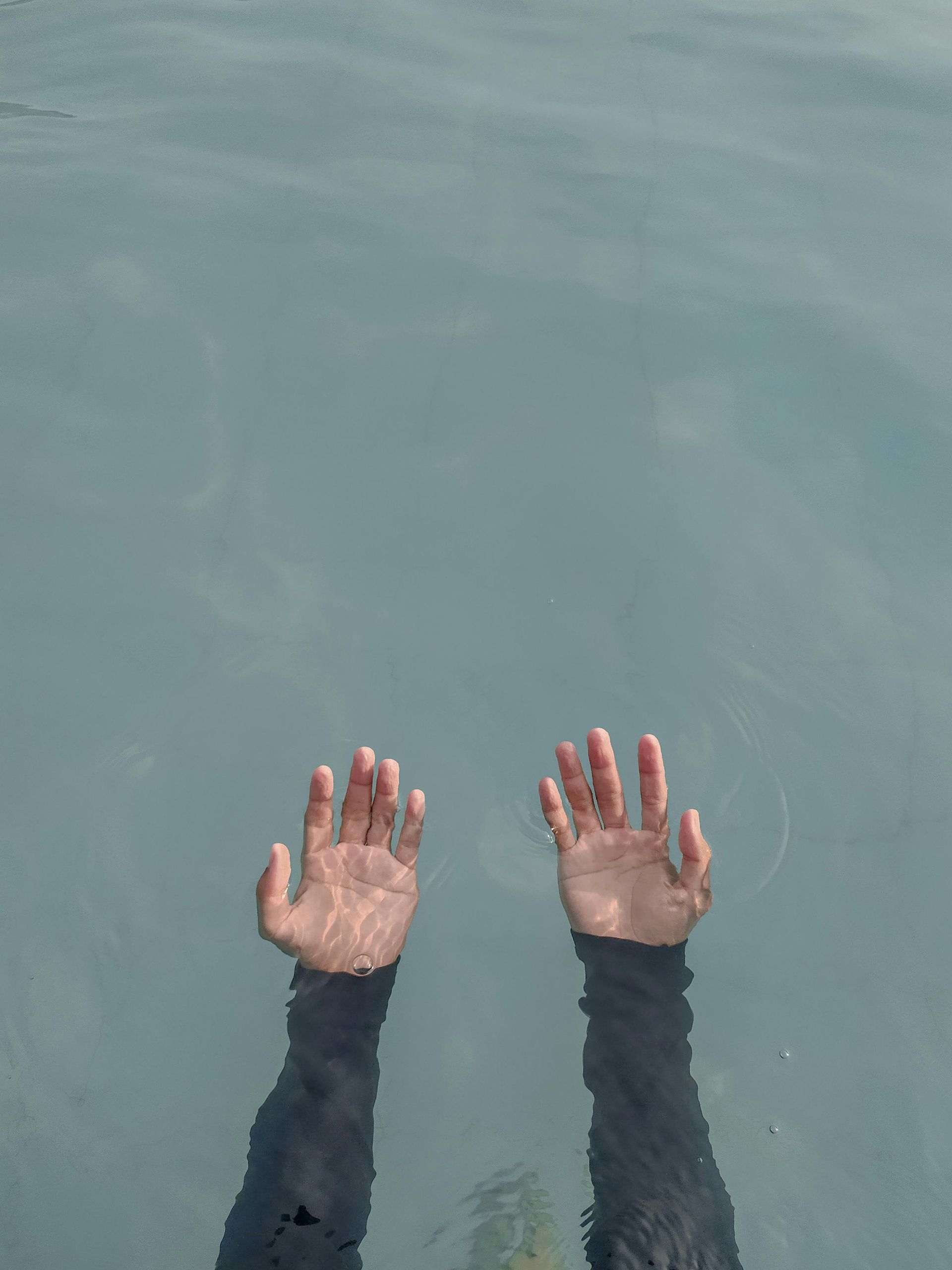 mindfulness practices, depression, hands in water