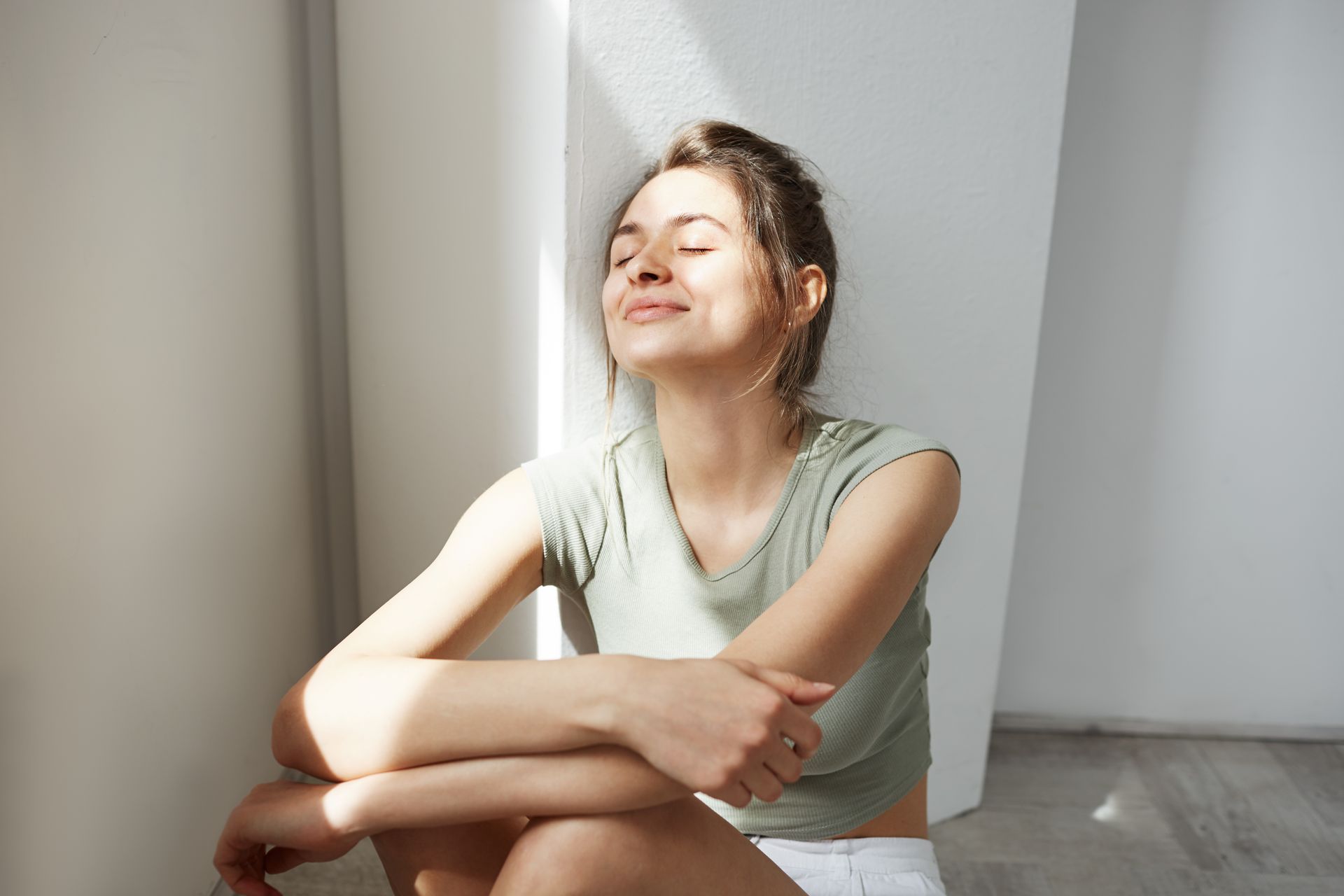 woman tuning inward, woman feeling joy, healing from the inside out