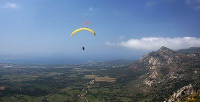 Hangliding above the mountains near Montemaggiore hangliding over mountains near Montemaggiore, corsica