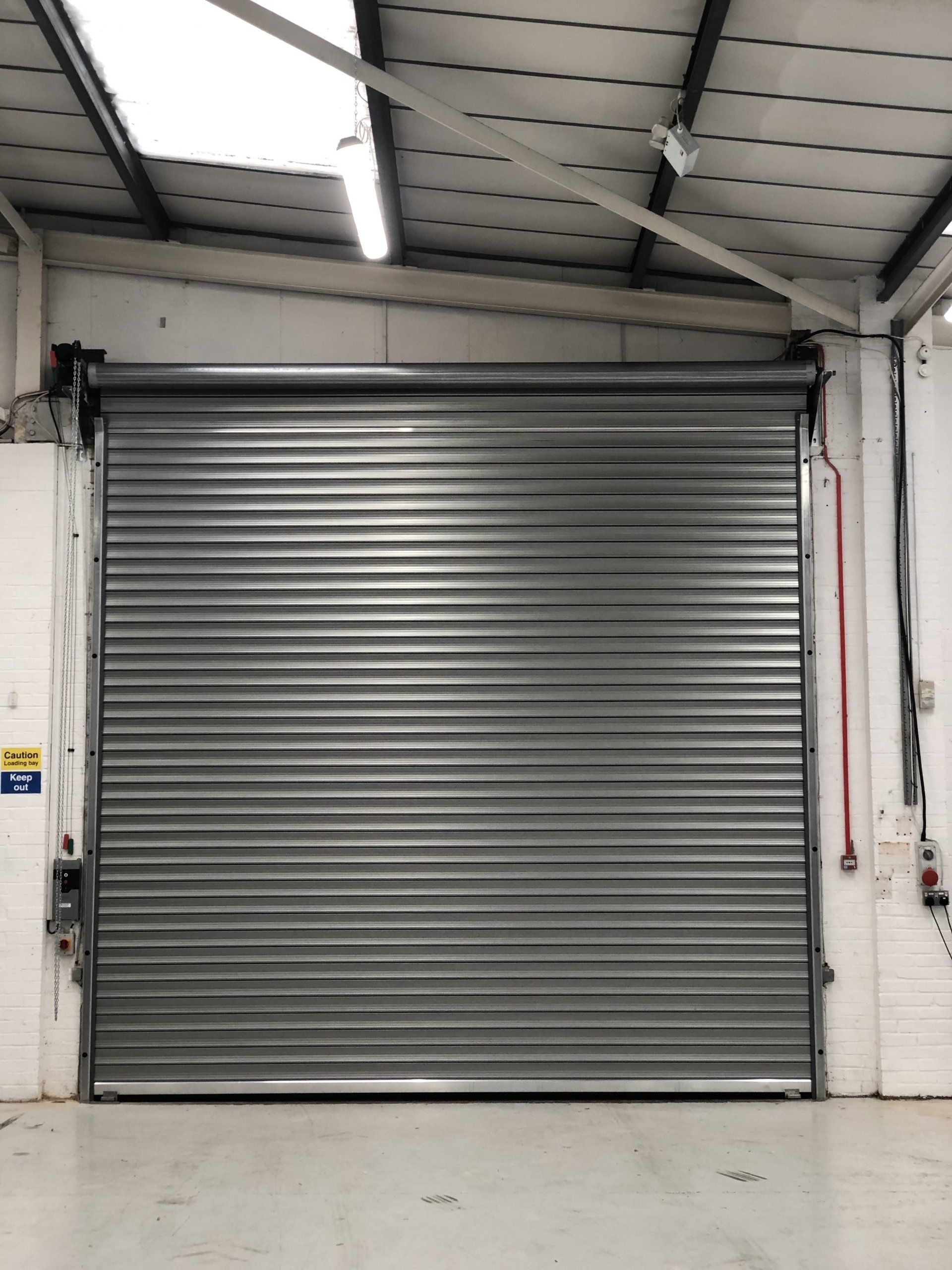 Industrial roller shutter door inside warehouse