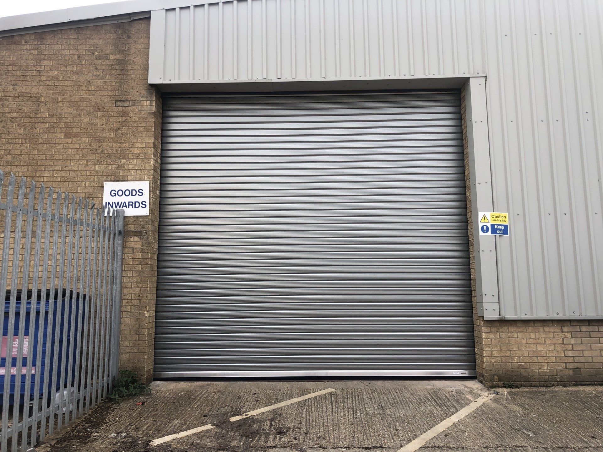 Silver industrial roller shutter door