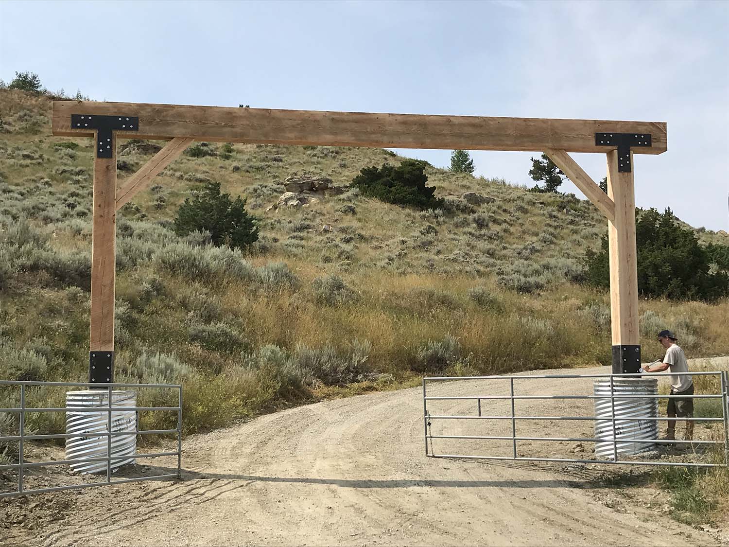 head gate for a ranch, seen from the road