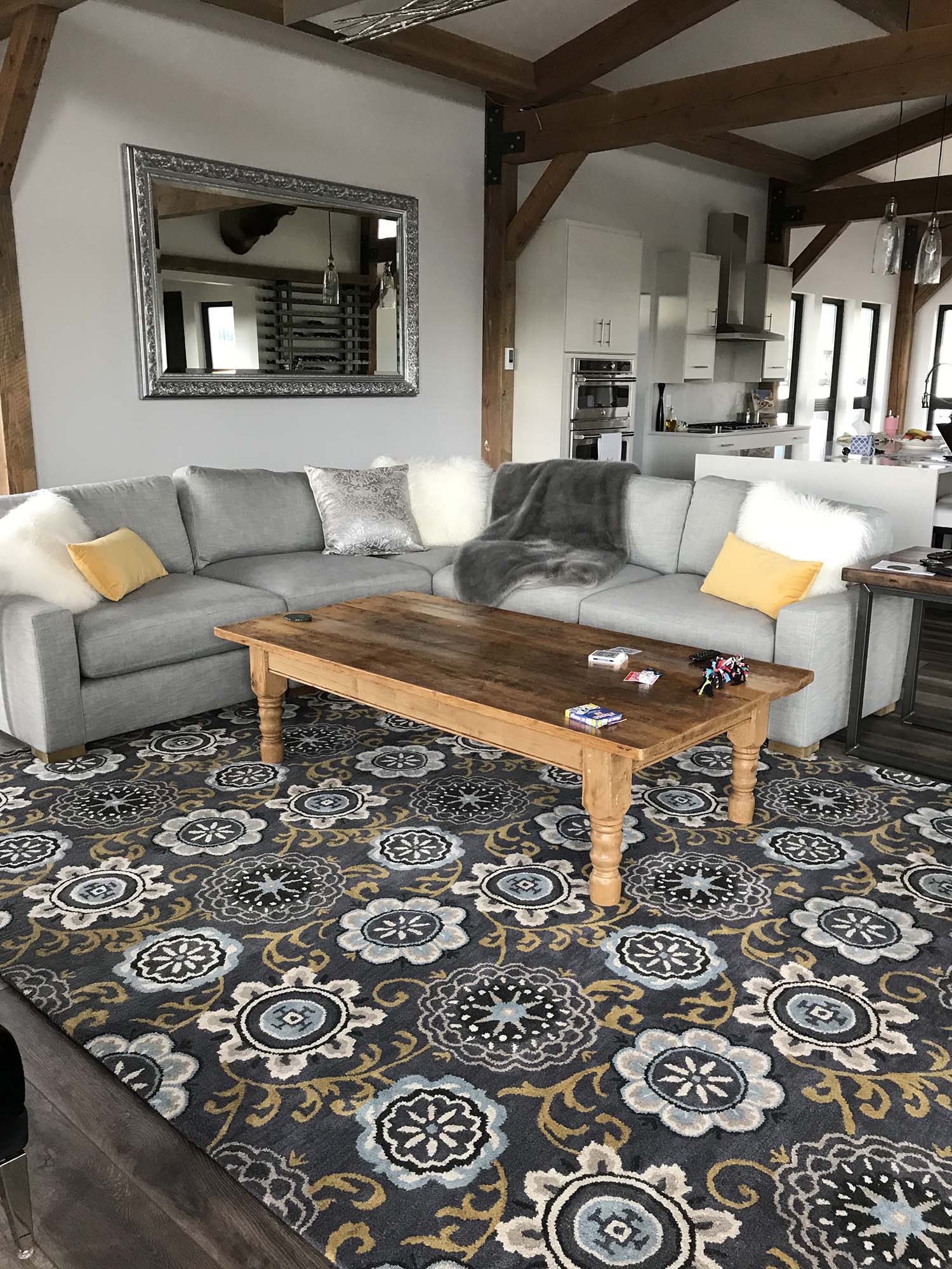 living room of completed house with wooden beams