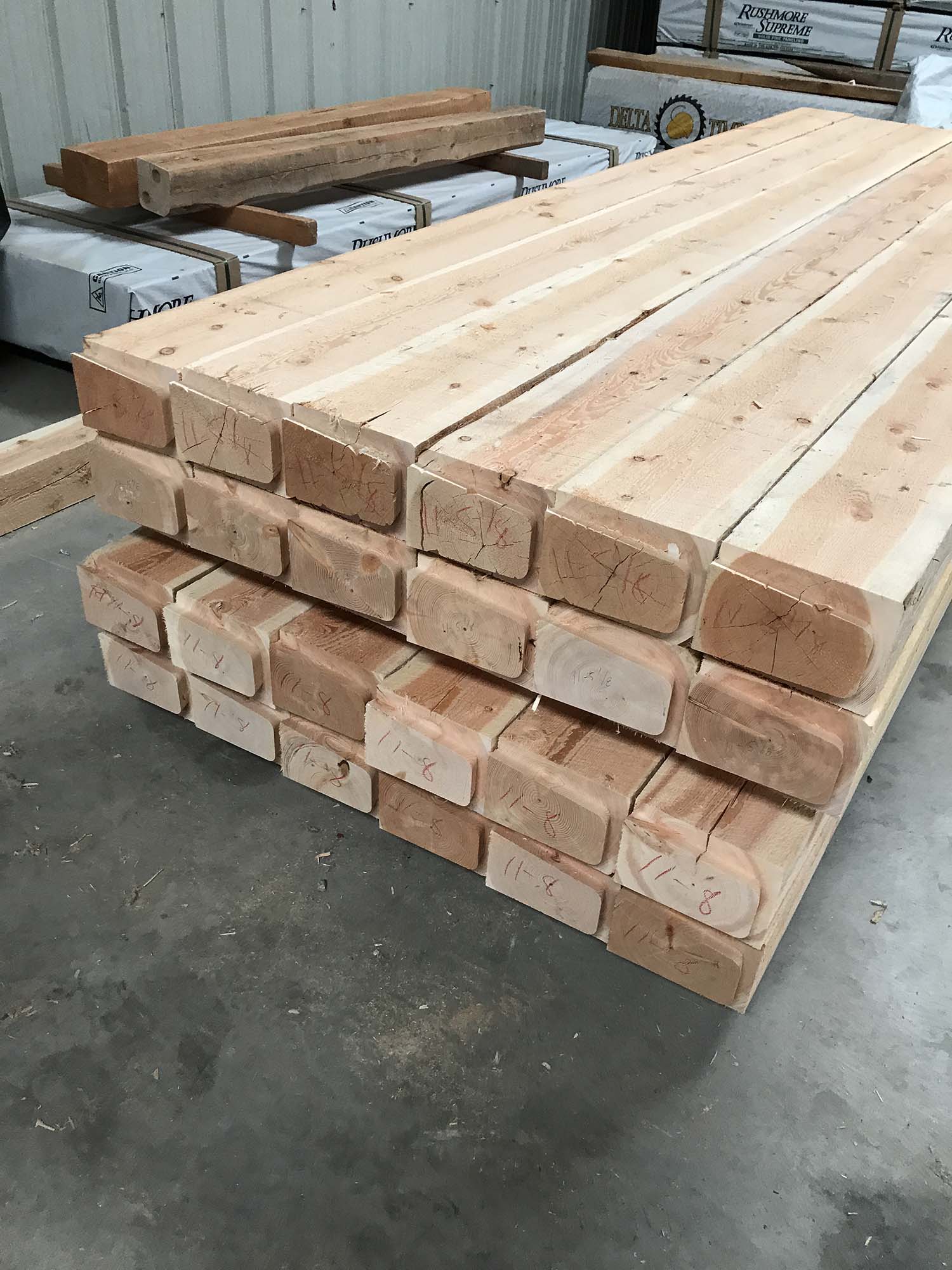 2x4's stacked on top of each other in warehouse