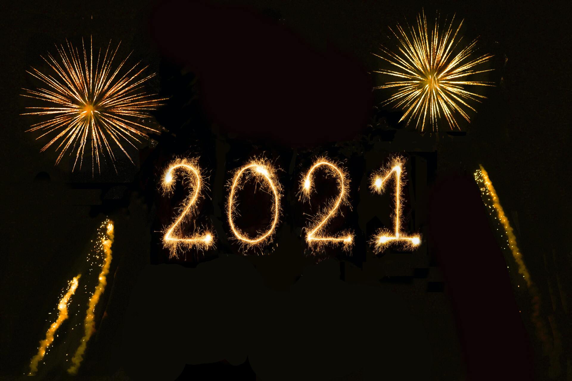 The year, 2021, is highlighted using sparklers