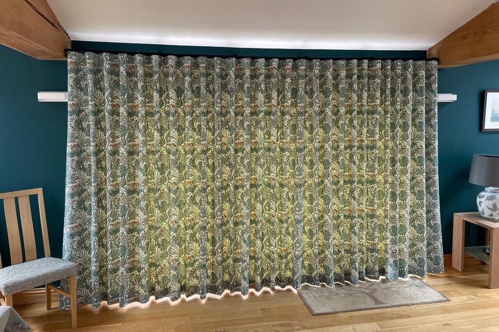 Clarke and Clarke fabric wave heading curtains