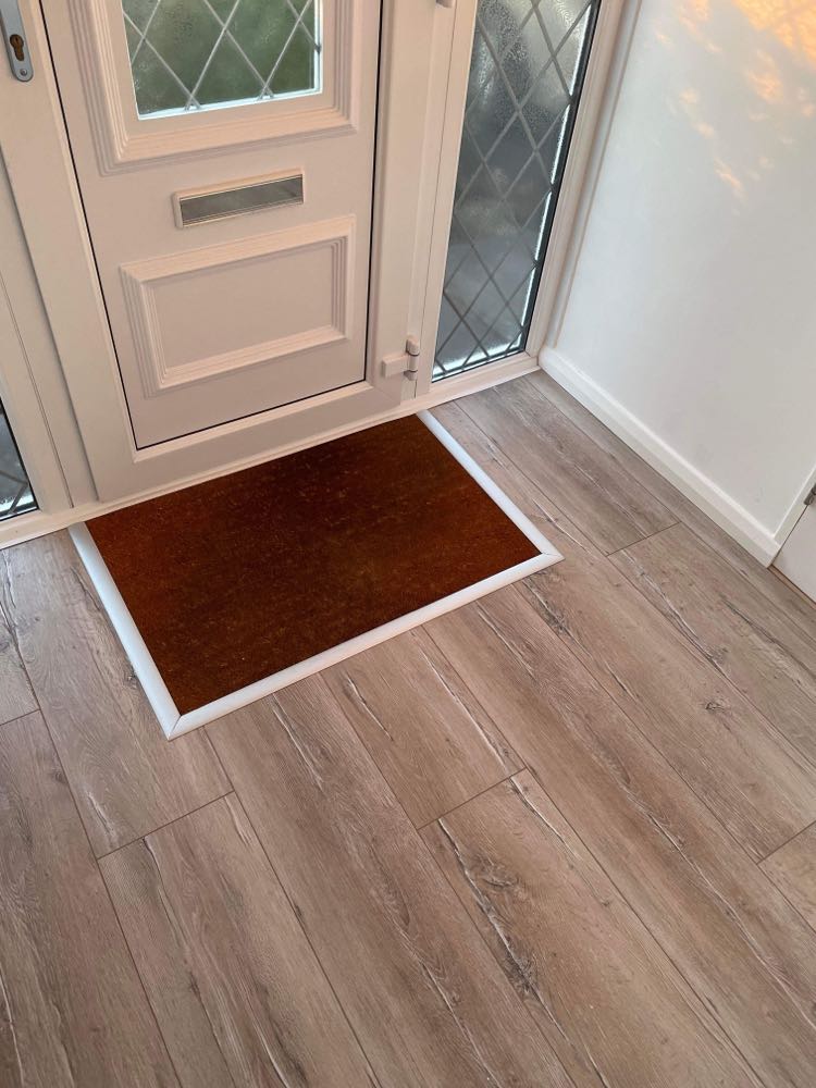 Luxury Vinyl Tile Flooring with entrance matting