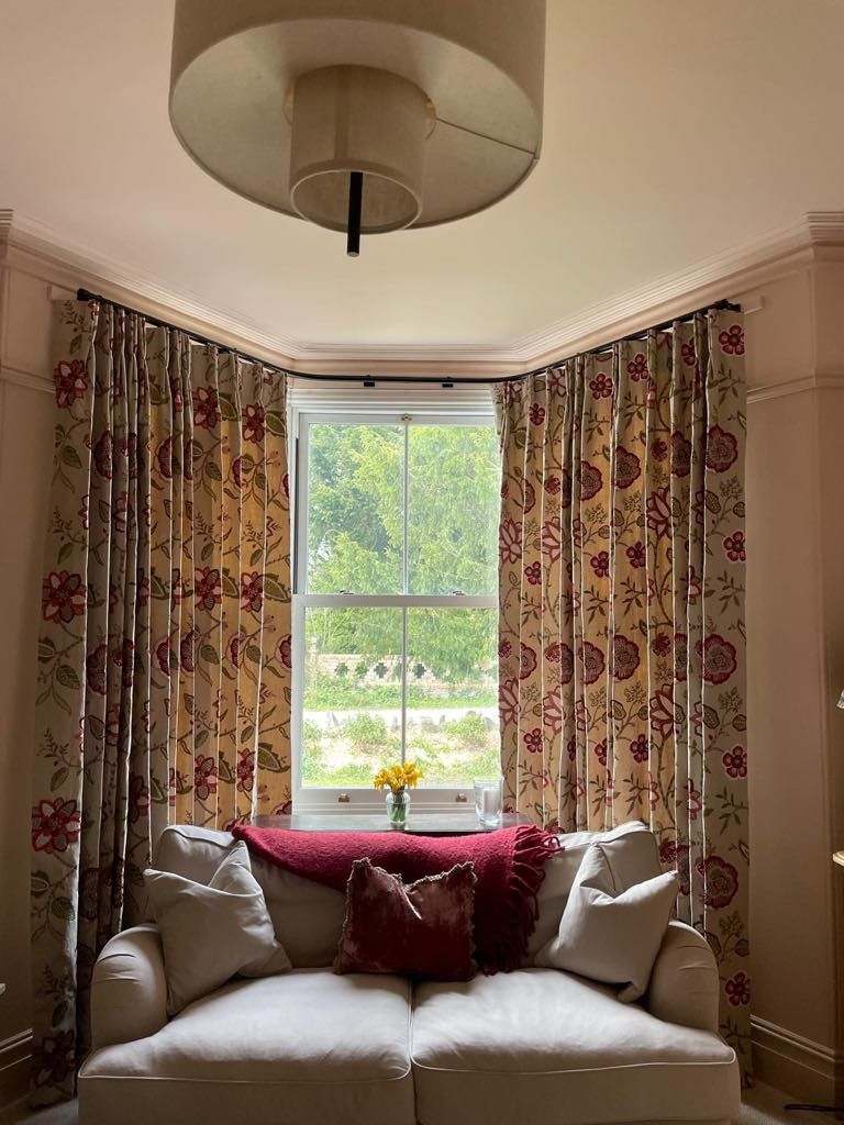 Jane Churchill fabric curtains and bay window curtain track