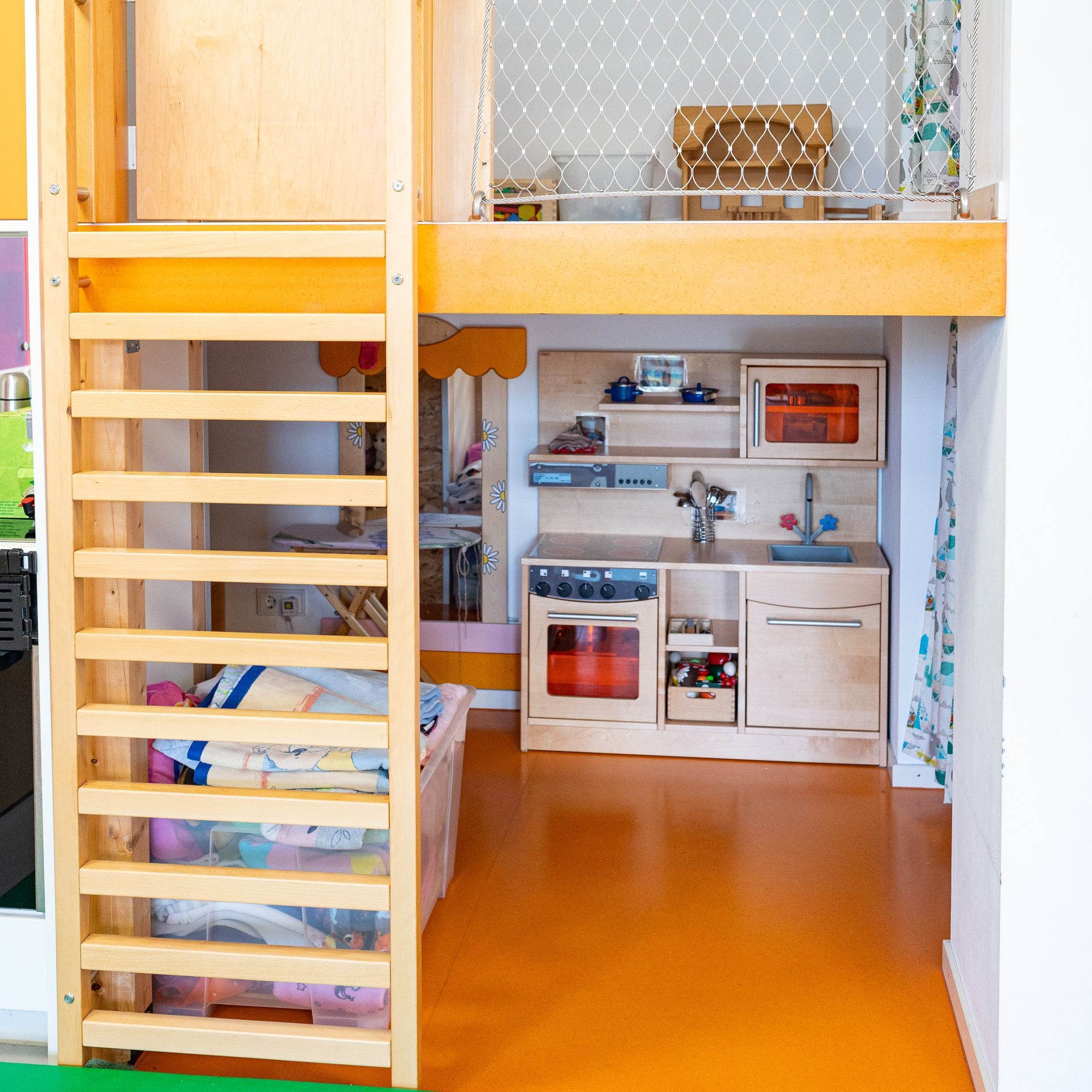 Abbildung Gruppenraum mit Spielküche