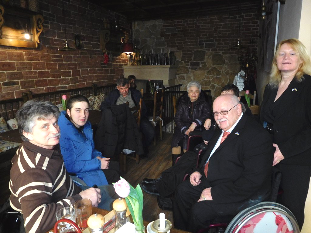 Our manager, Keith, accompanied by his wife meeting with disabled people in Lviv, Ukraine