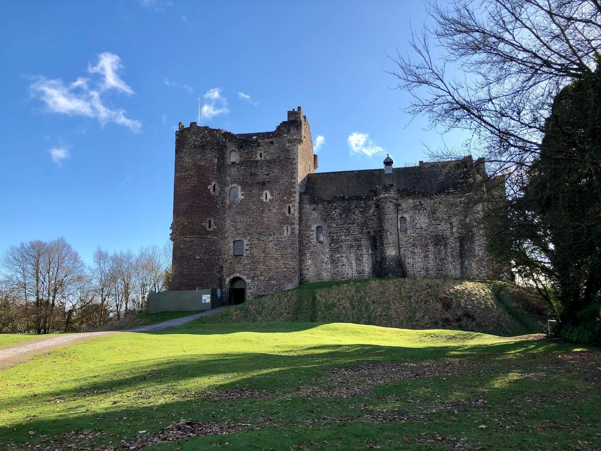 Doune Castle, pictured on a sunny day on a private tour.