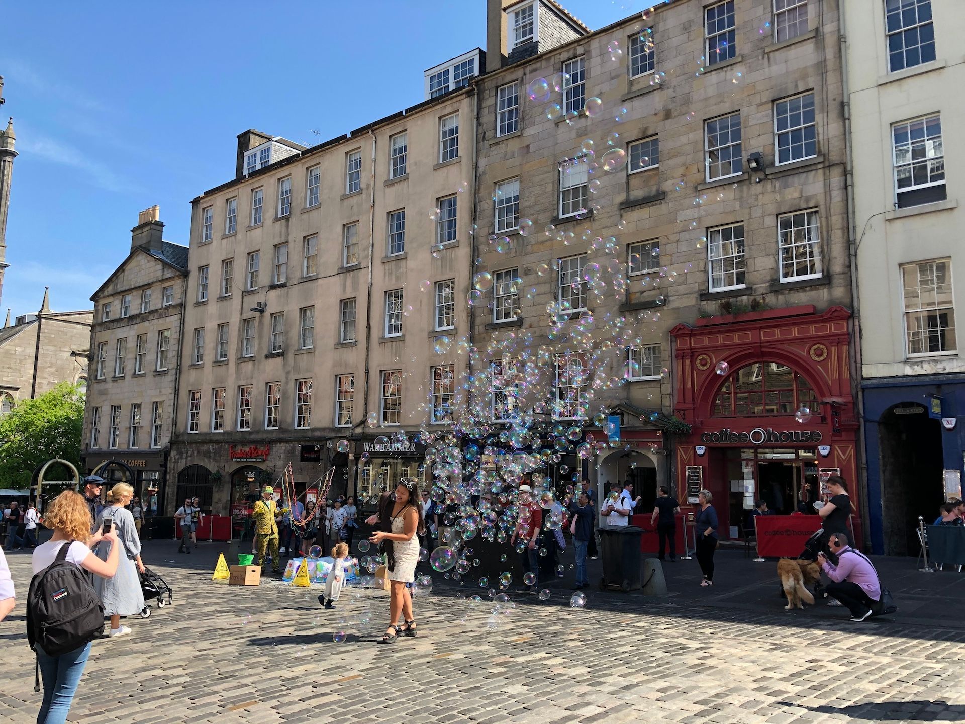 A street performer with many bubbles at Edinburgh's Fringe Festival
