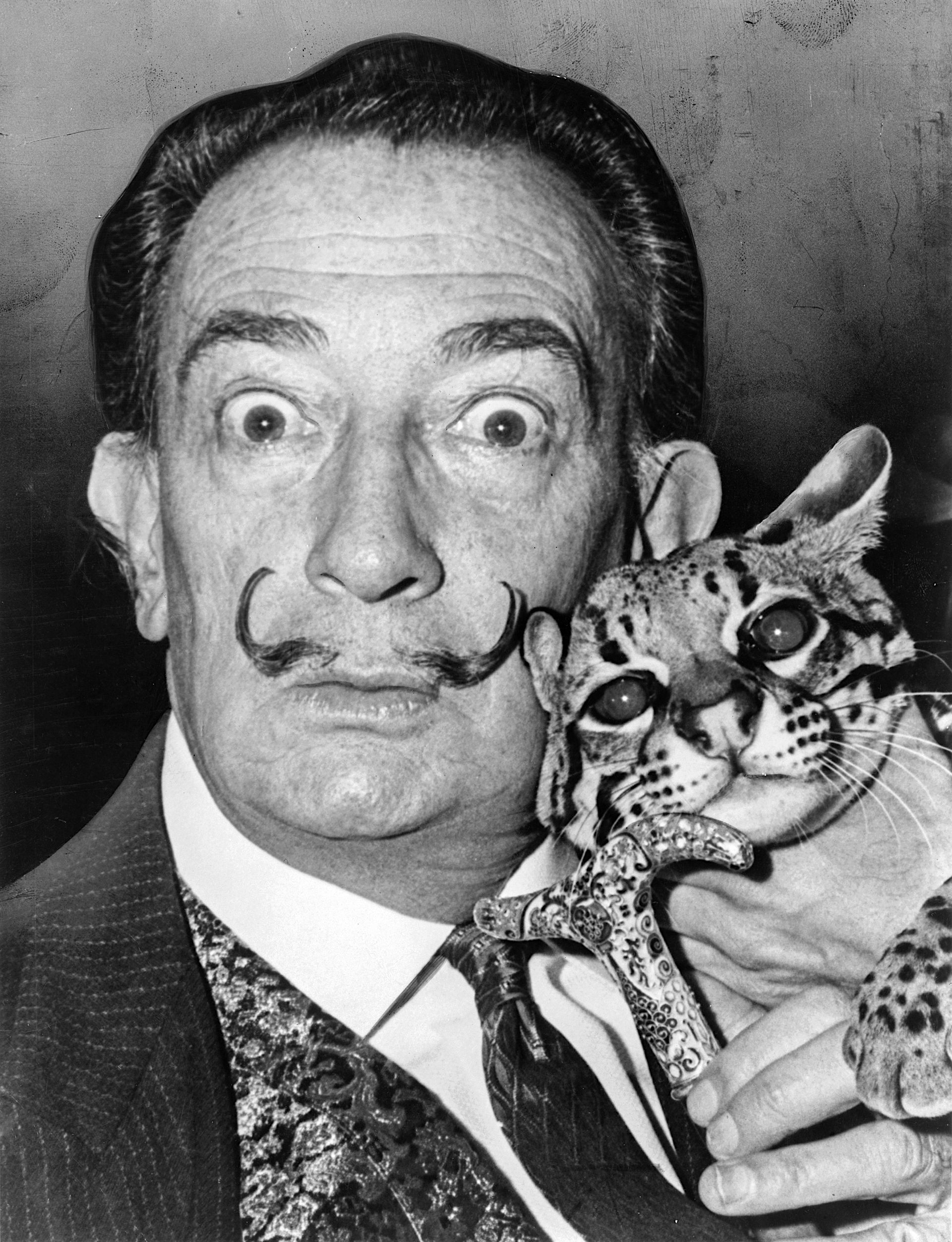 This is not a photo of Lee Dean. Salvador Dali and ocelot - public domain image.