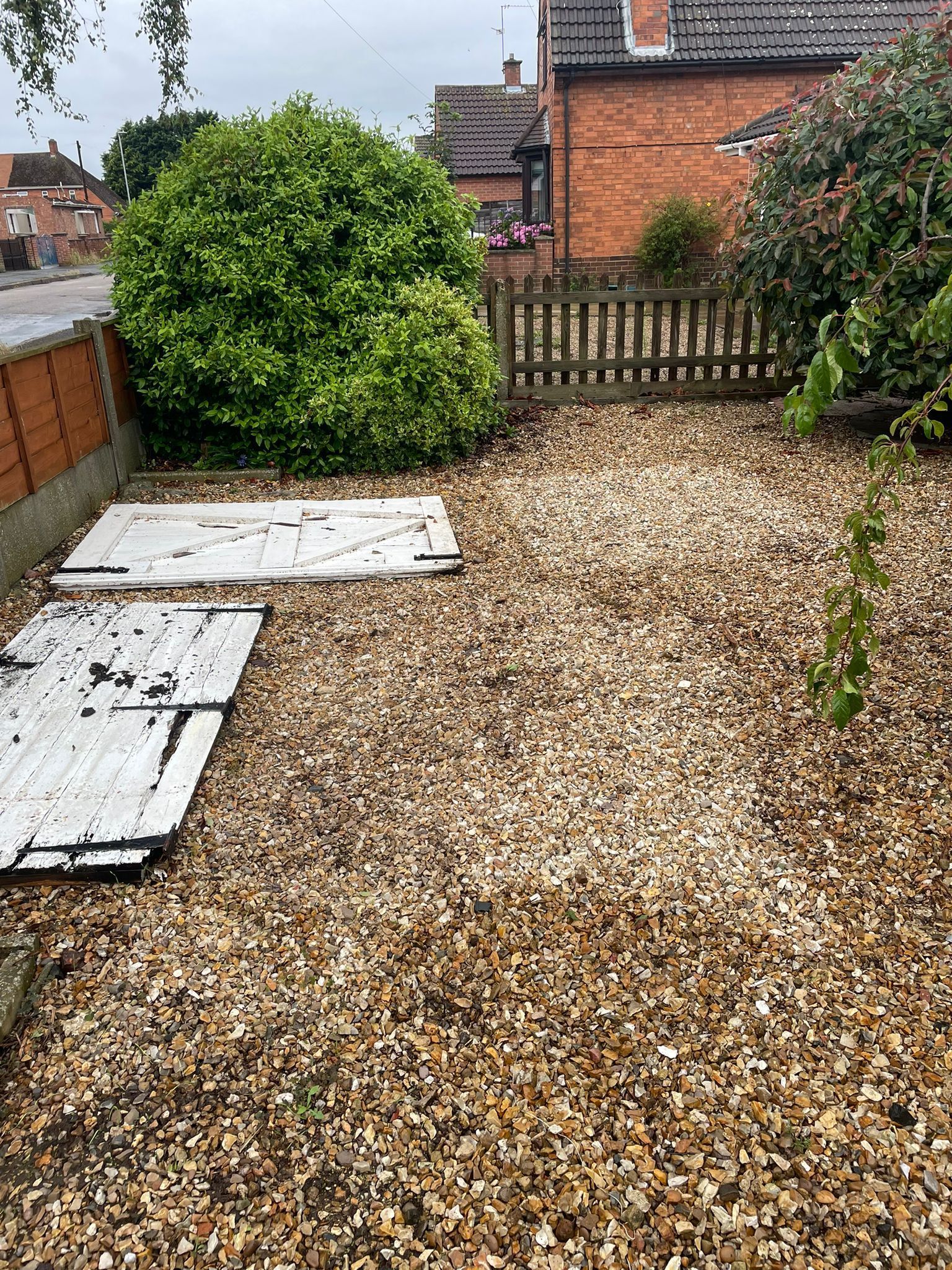 gravel driveway showing the asbestos has been removed and just the gravel driveway left
