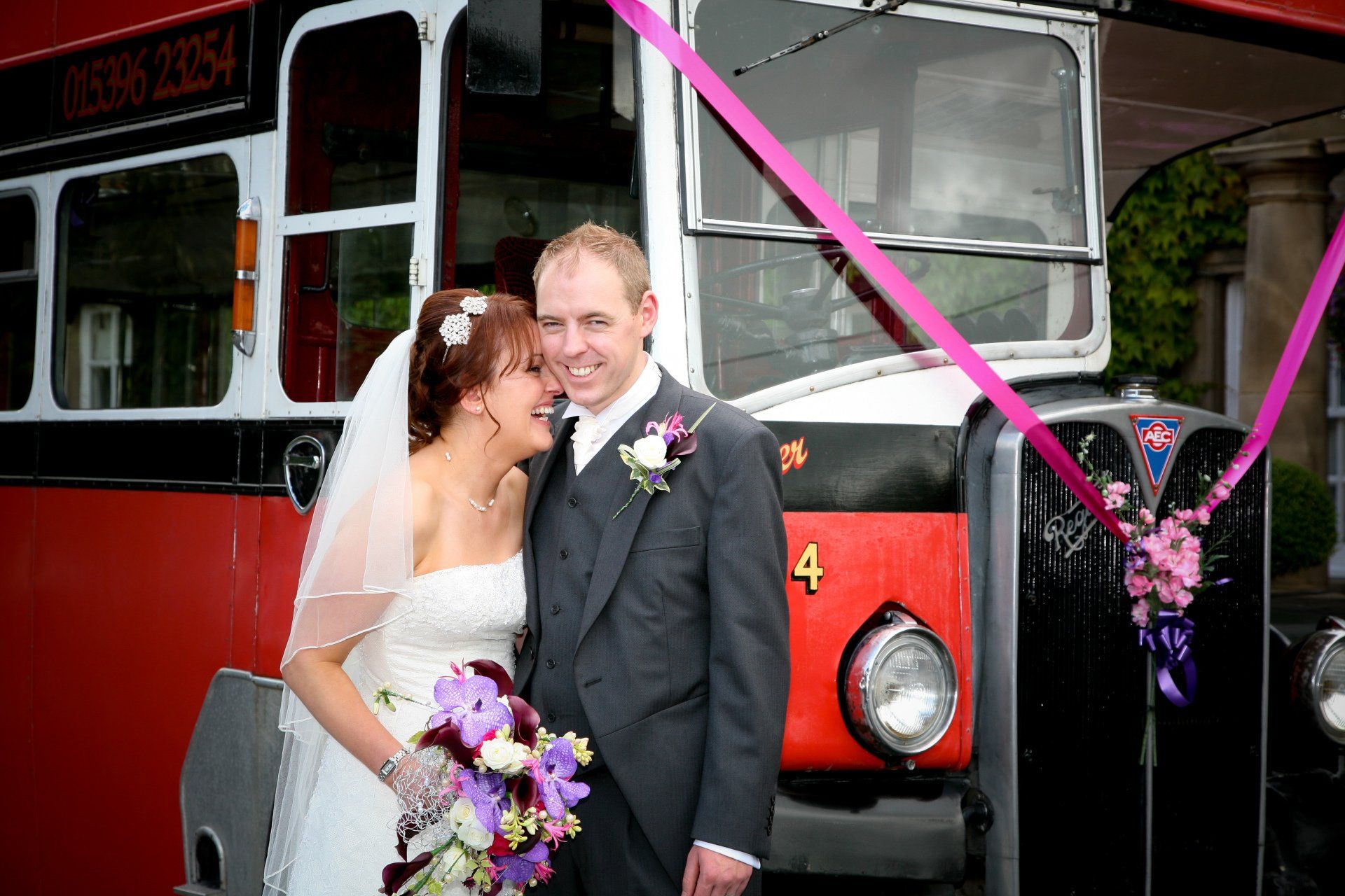 bride and groom with vintage double decker bus at the morritt, baarnard castle with photographer kate mitford from mitford photography