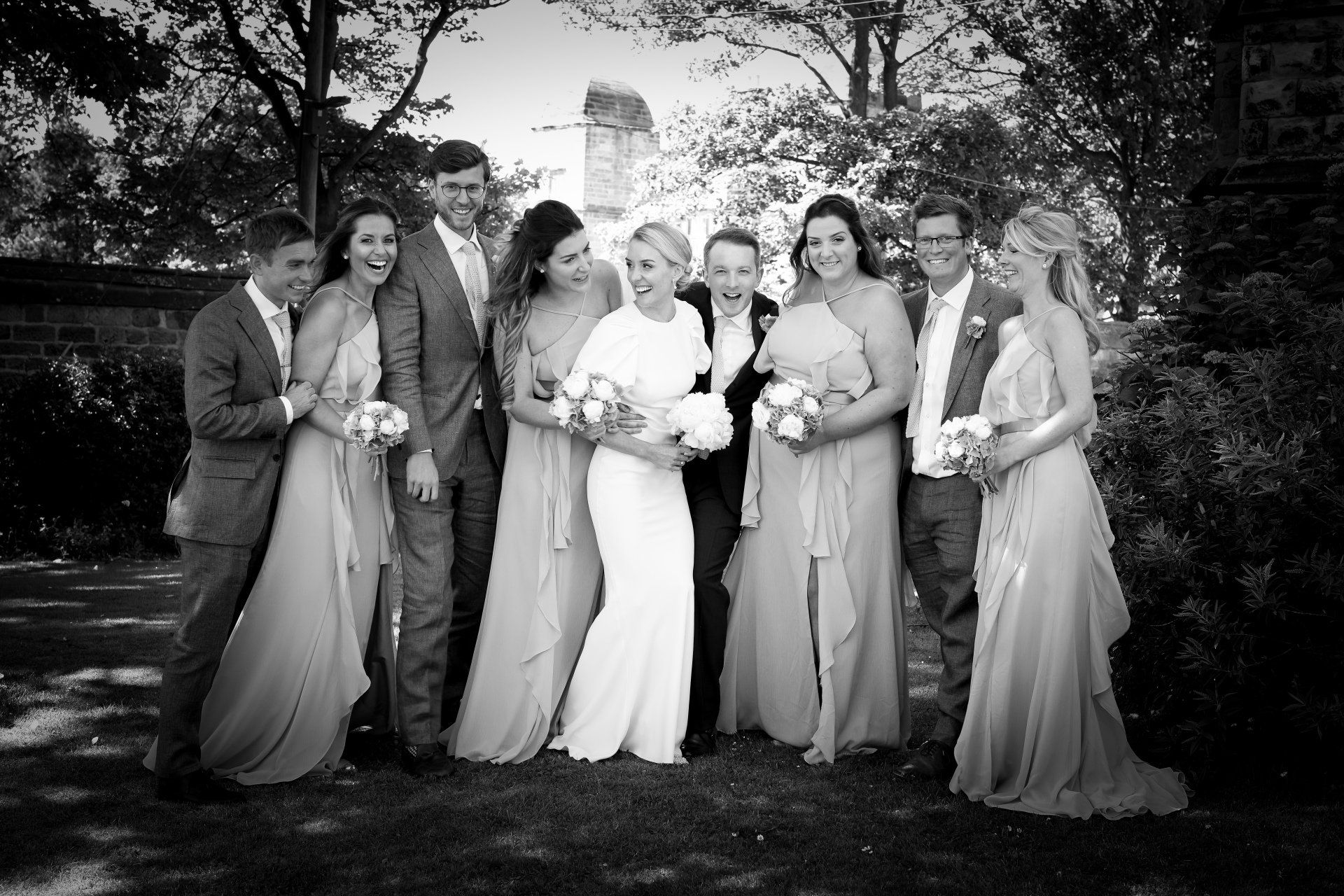 bridal party photography by kate mitford at a church wedding in the summer