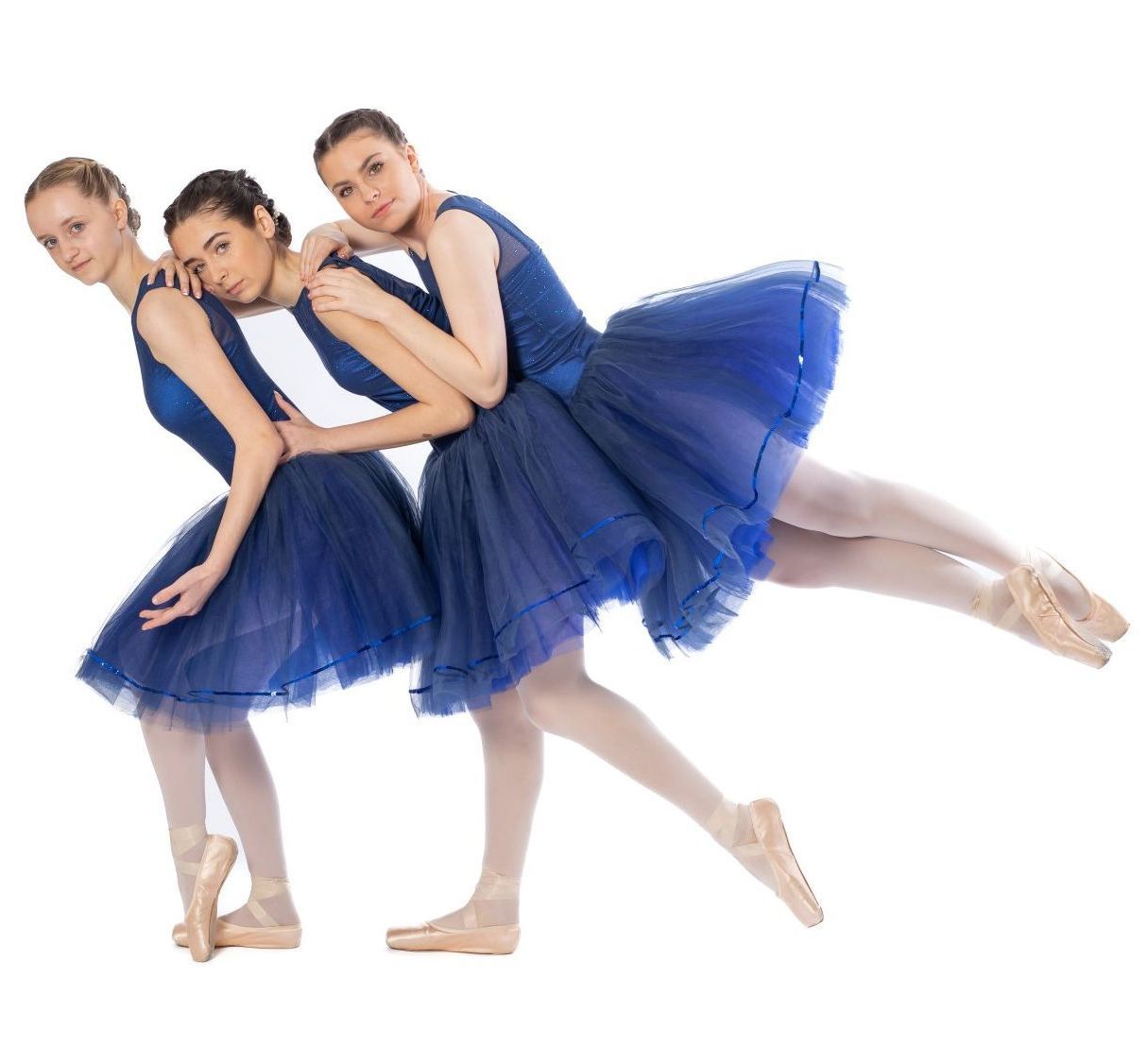 3 dancers doing a dance move in their styled dance portrait session, studio session with kate mitford, award winning photographer in darlington