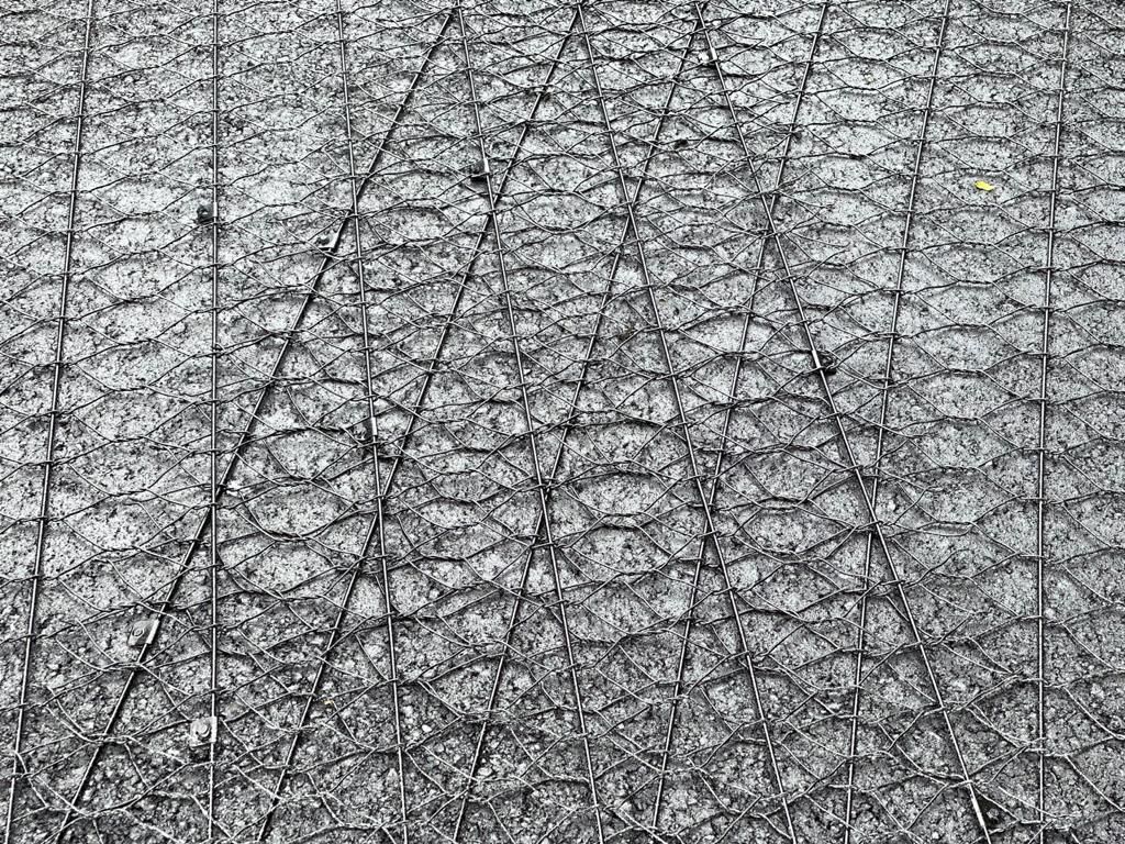 Asphaltarmierung, Roadmesh, Asphaltverstärkung, Geogitter, Straßenbau, Straßensanierung, Asphaltstabilisierung, Asphaltbelag