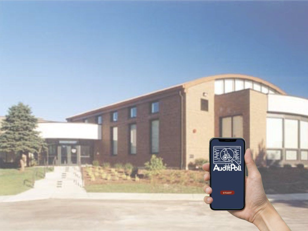 Image of a polling place in the background and in the foreground is a female hand holding an iPhone with an AuditPoll Screen.
