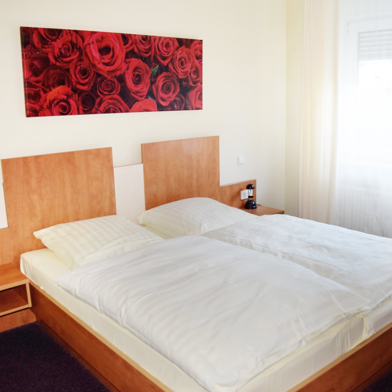 Zimmer und Service Abbildung Bett Doppelzimmer