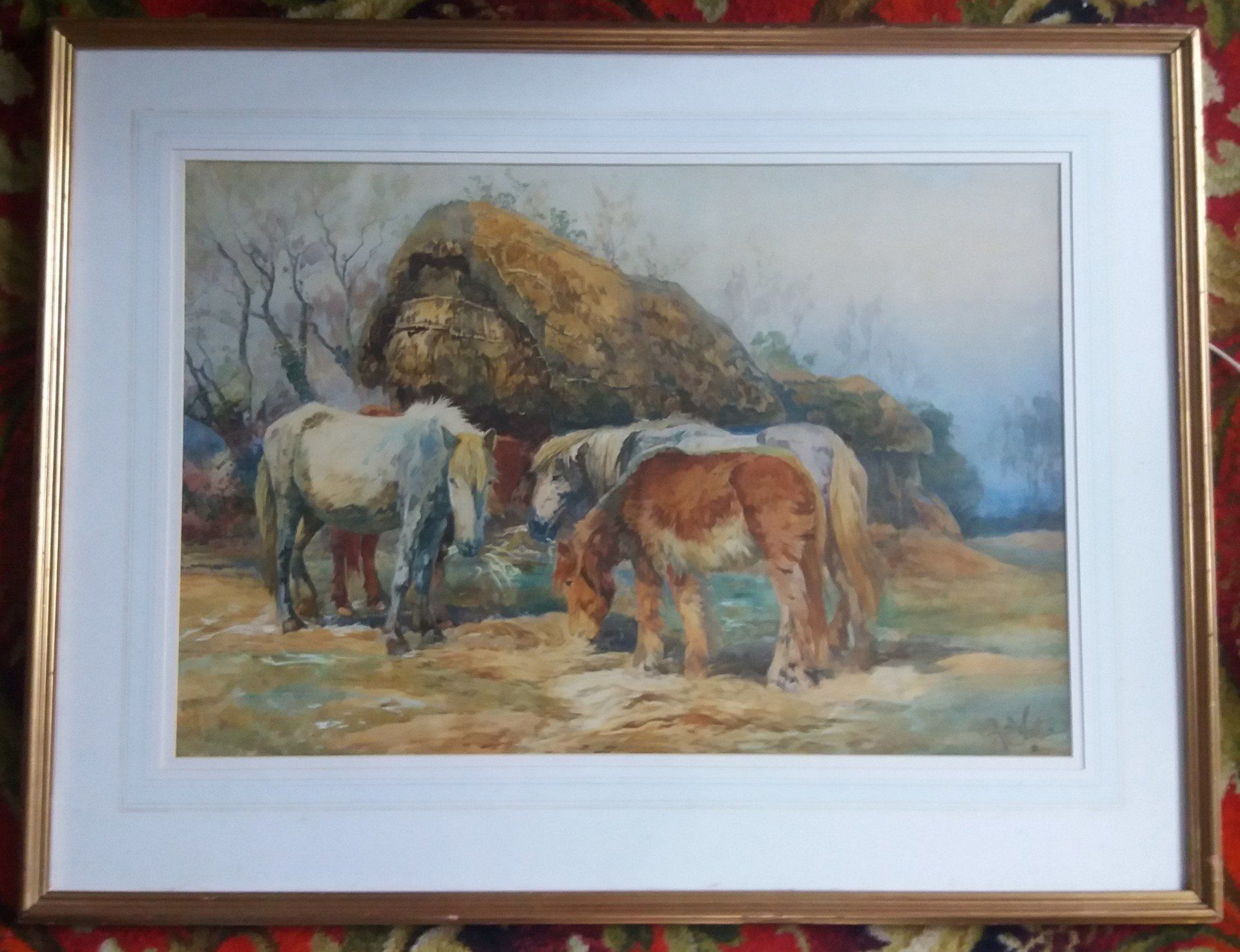 Antique watercolour of 3 horses grazing in front of a thatched barn.
