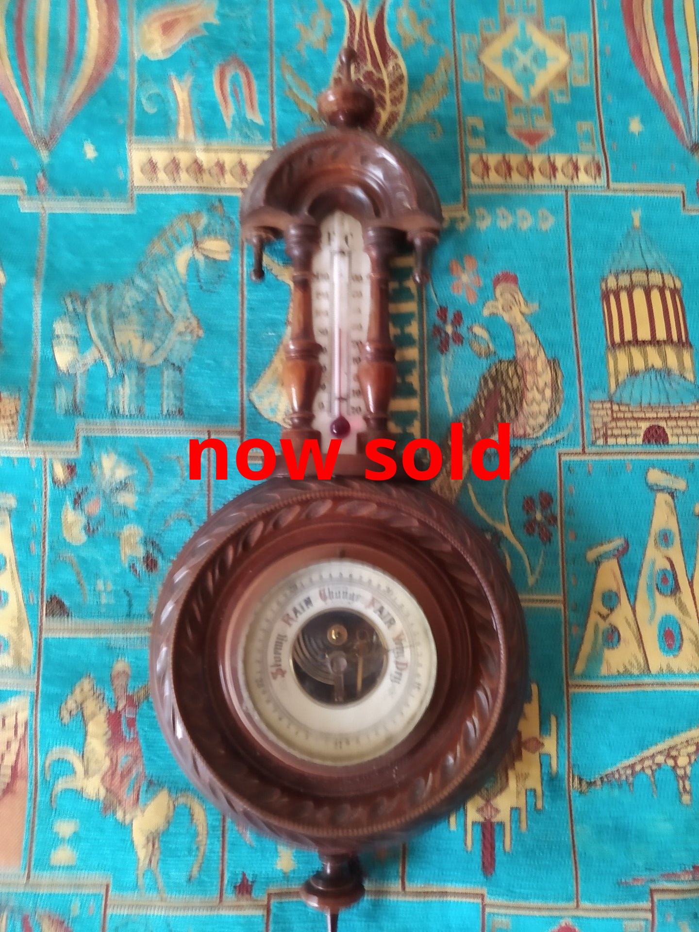 Decorative antique aneroid barometer.