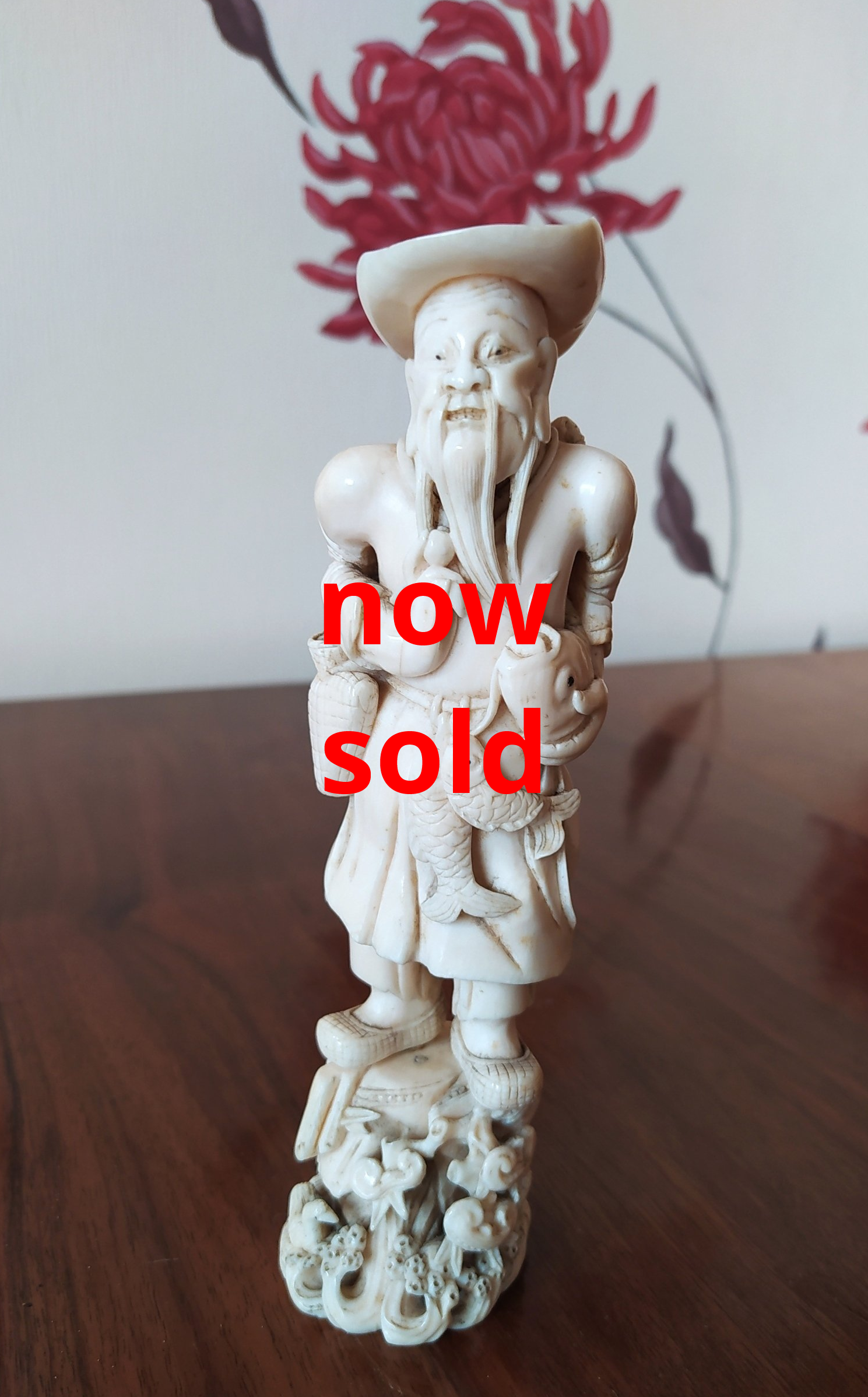 Meiji period okimono of a fisherman.