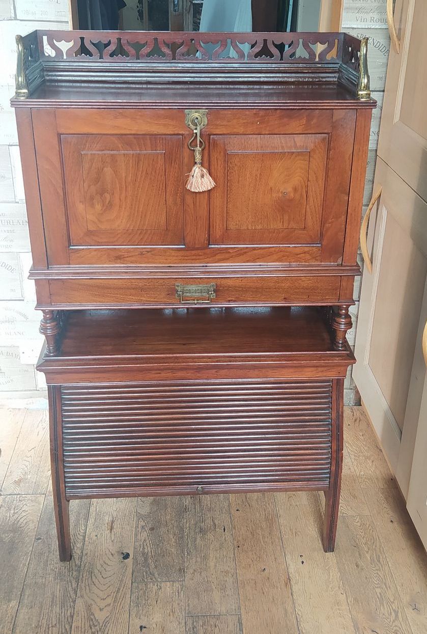 Antique desk with tambour front.