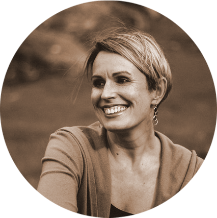 Alexandra Bitzer - Golden Healer Support Coach - New Earth Medicine Alexandra Bitzer, powerful woman with short blond hair and golden healer support coach