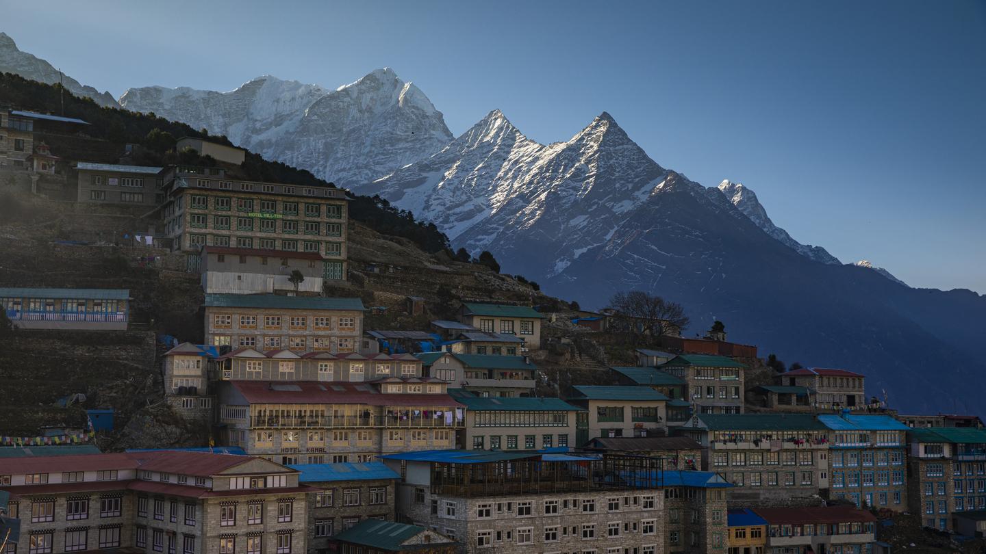 The mountain village of Namche Bazaar built into the steep hillsides of the Everest region in Nepal.