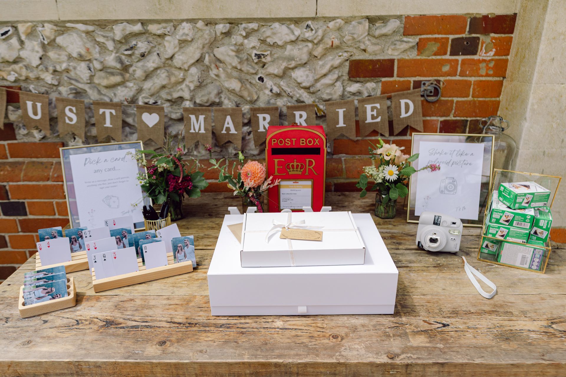 Guest book and poloroid table at Kingsettle Stud co-ordinated by Tasha Mae Wedding Co-ordinator.