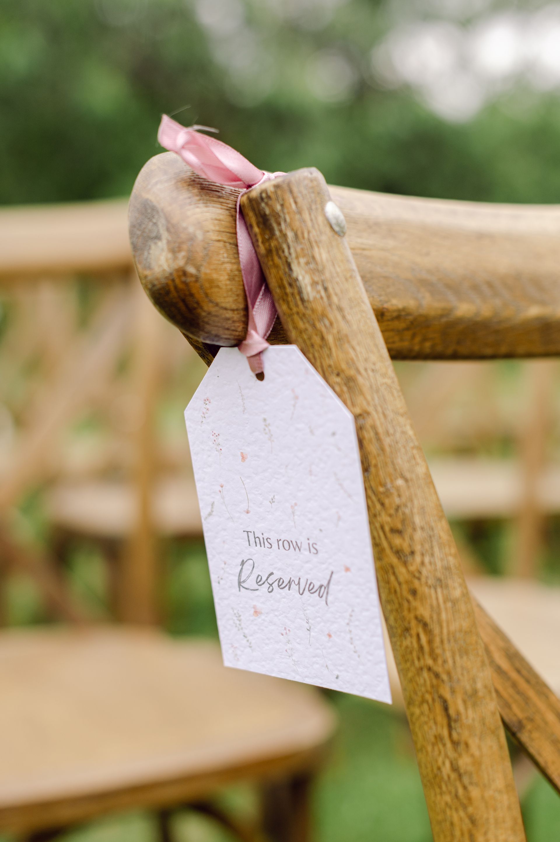 Reserved chair signs for wedding ceremony at Kingsettle Stud co-ordinated by Tasha Mae Wedding Co-ordinator.