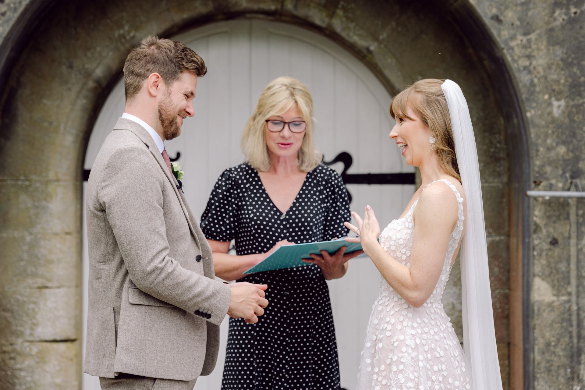 Bride and groom with their celebrant at Kingsettle Stud co-ordinated by Tasha Mae Wedding Co-ordinator.