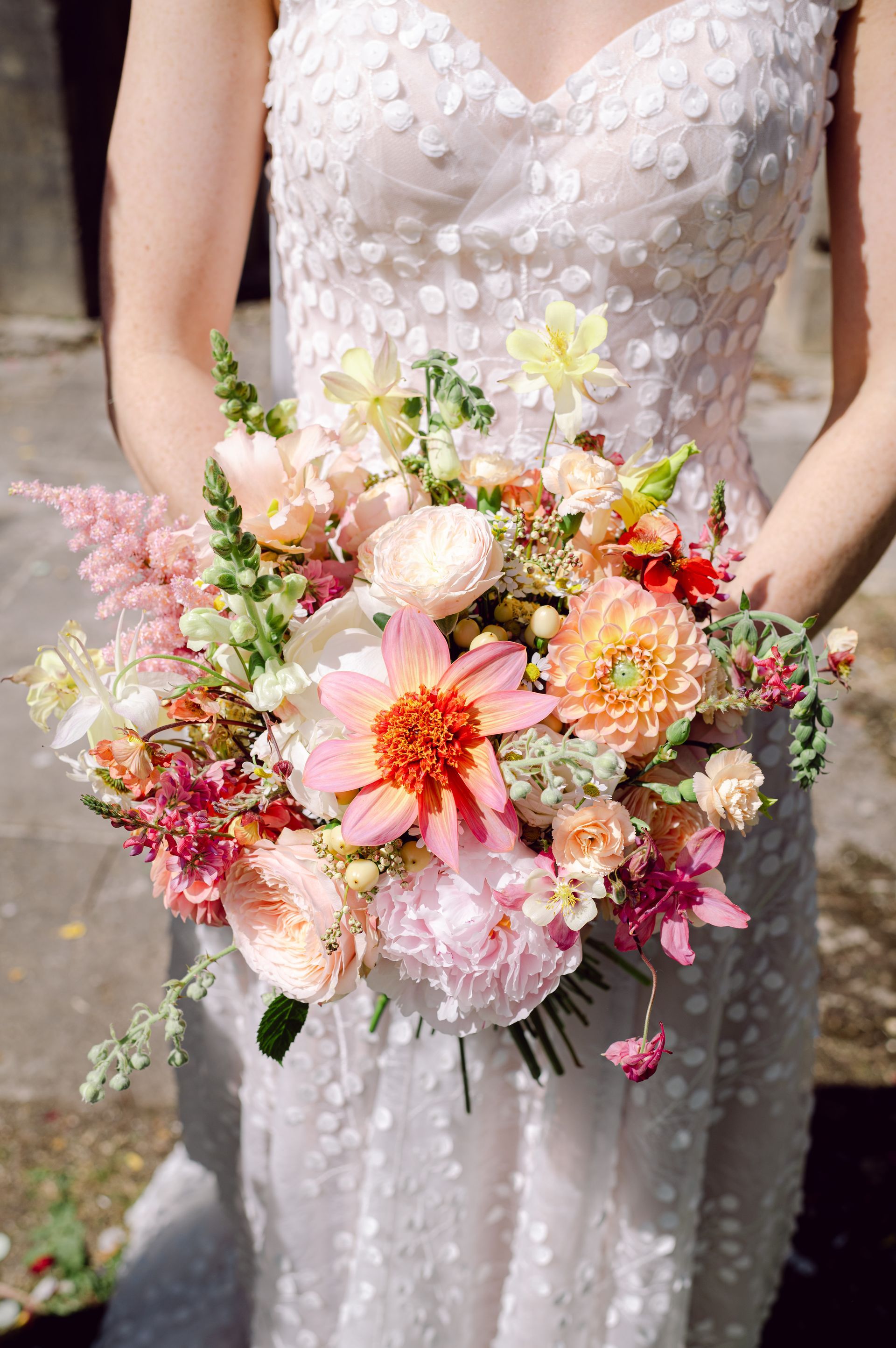 Bride and her bouquet arranged by Milston Flower Barn at Kingsettle Stud - co-ordinated by Tasha Mae Wedding Co-ordinator.