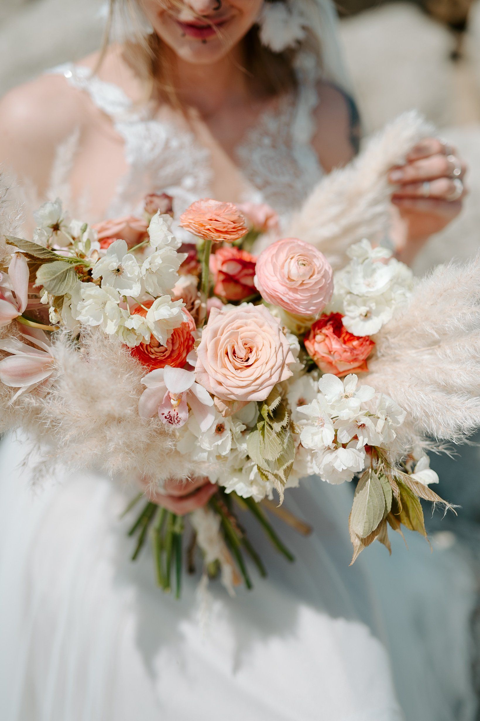 Summery brides bouquet on Highcliffe Beach in Dorset