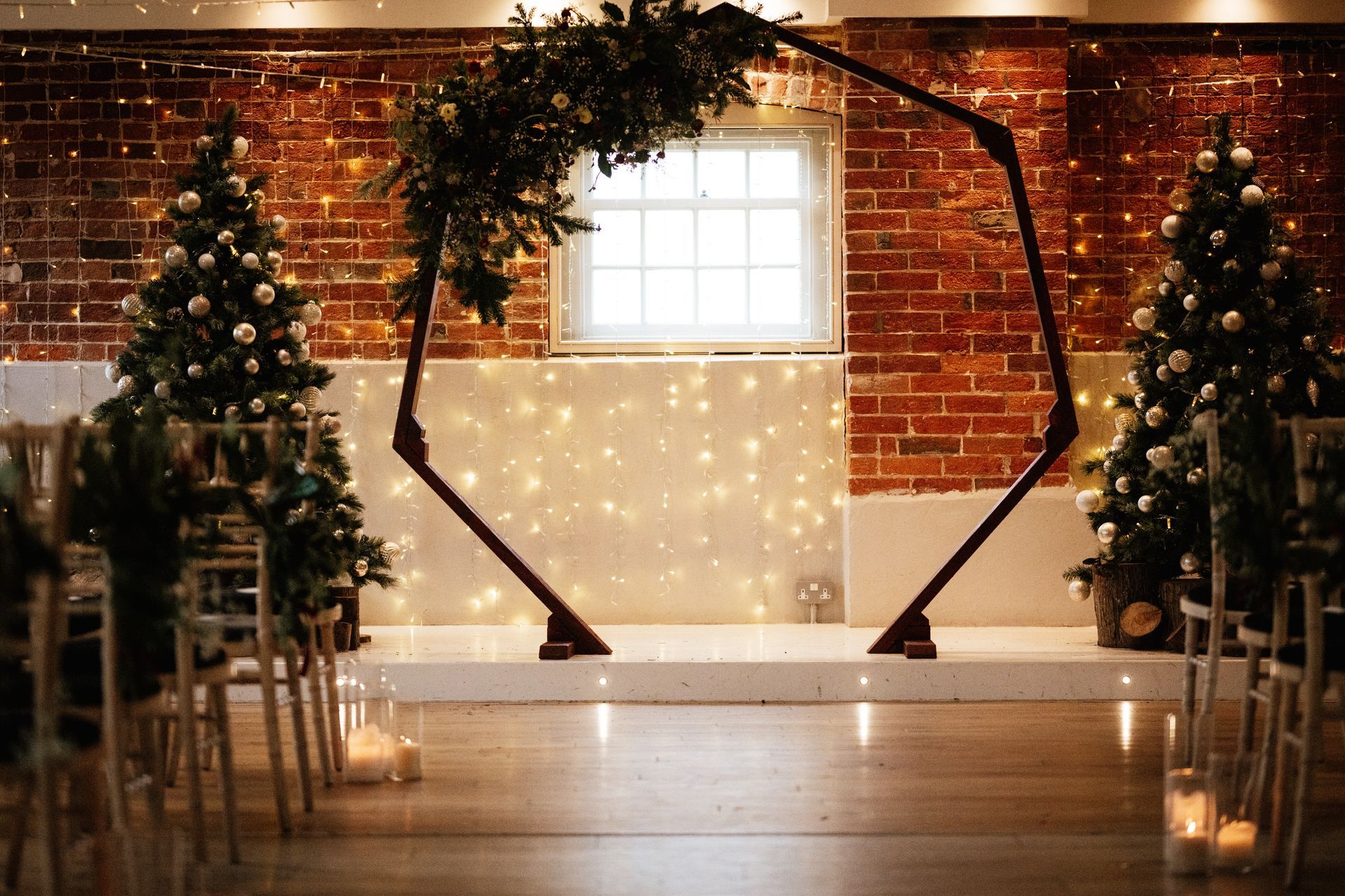 Christmas wedding decor for the ceremony at Sopley Mill with Tasha Mae Wedding Co-ordinator.