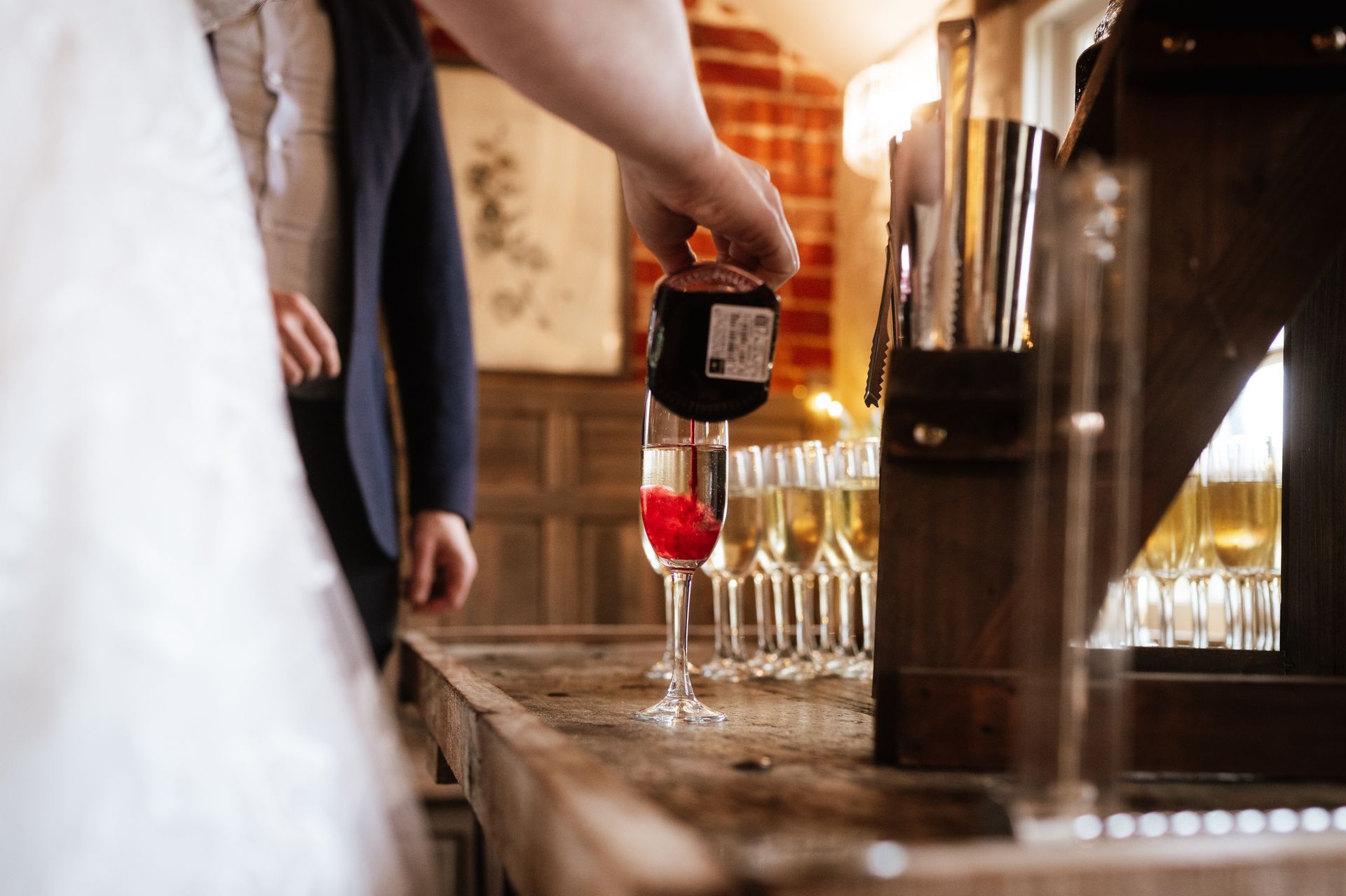 Pouring the prosecco flavours at Sopley Mill with Tasha Mae Wedding Co-ordinator.